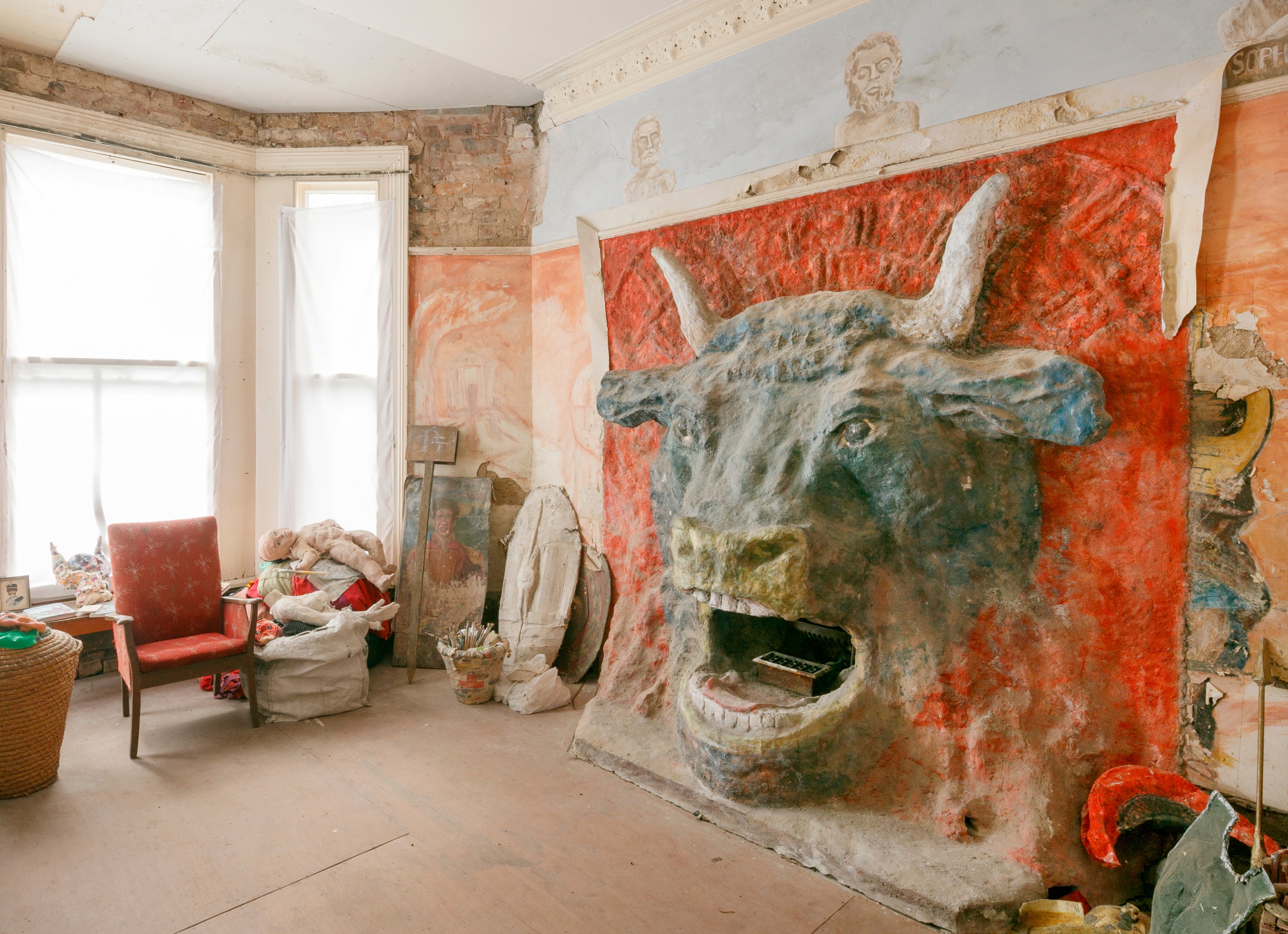 Not your average fireplace: Minotaur’s head takes centre stage in the living room