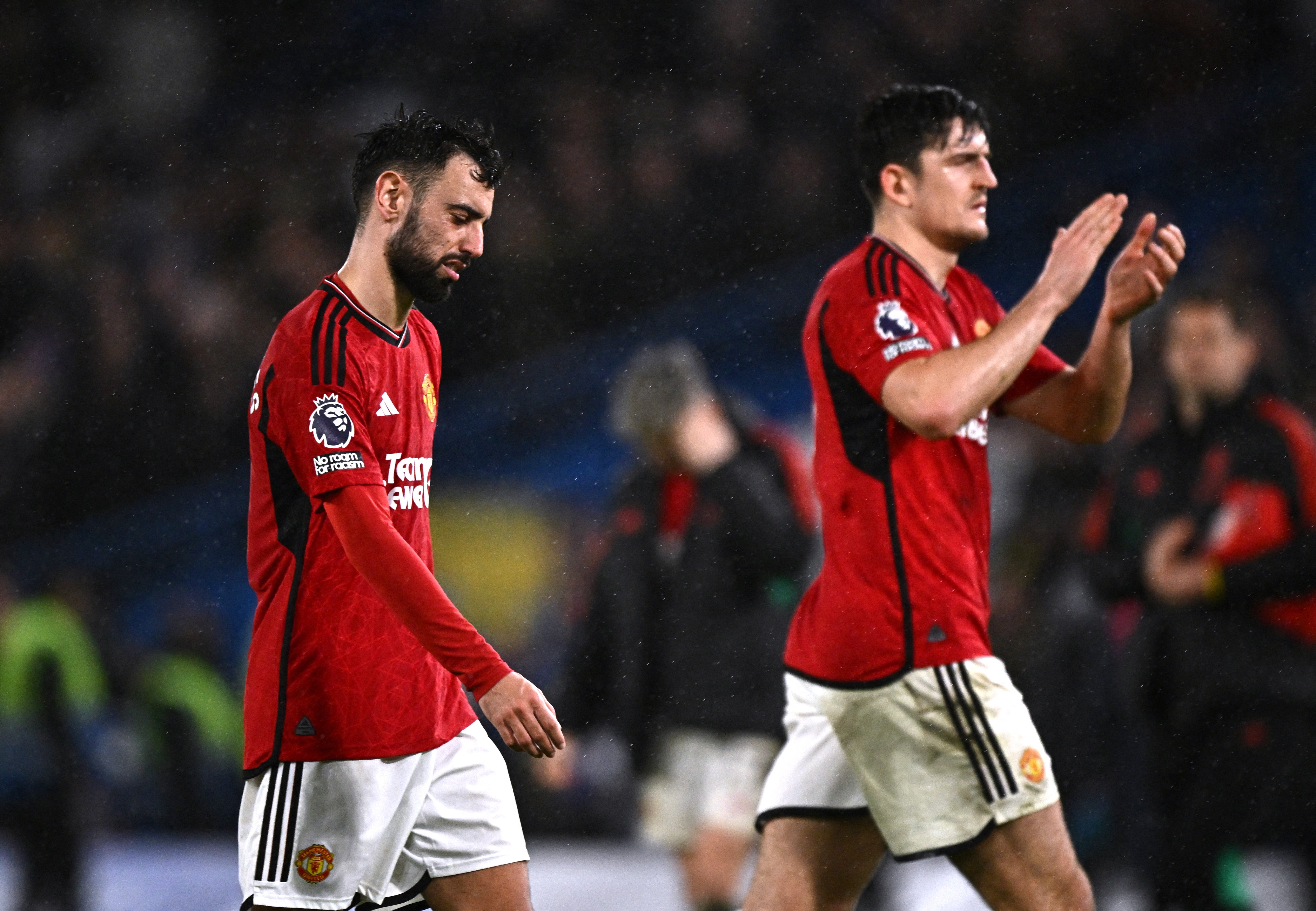 Manchester United's Bruno Fernandes and Harry Maguire look dejected after the match