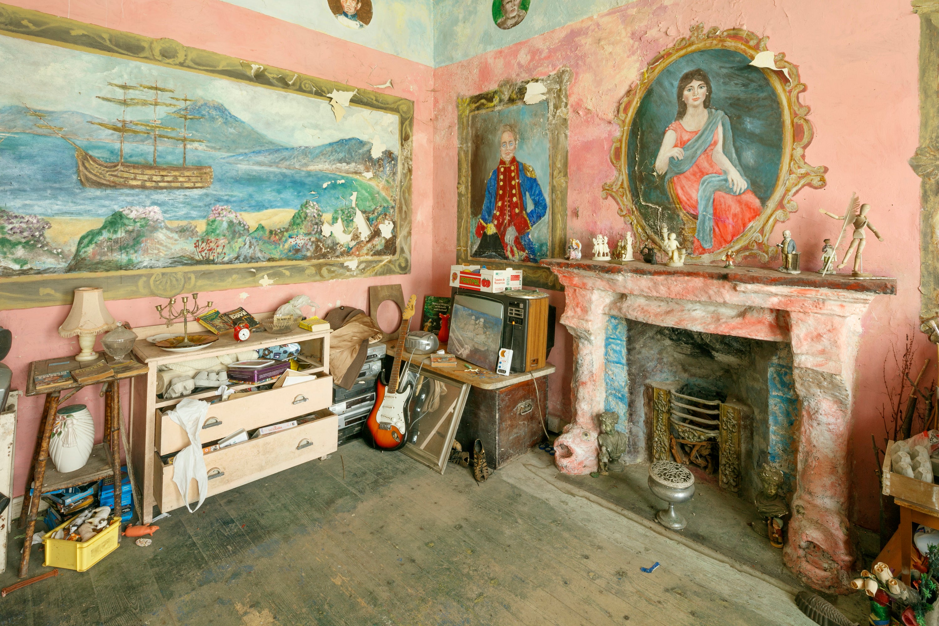 Gittins painted mock oil paintings directly to the walls