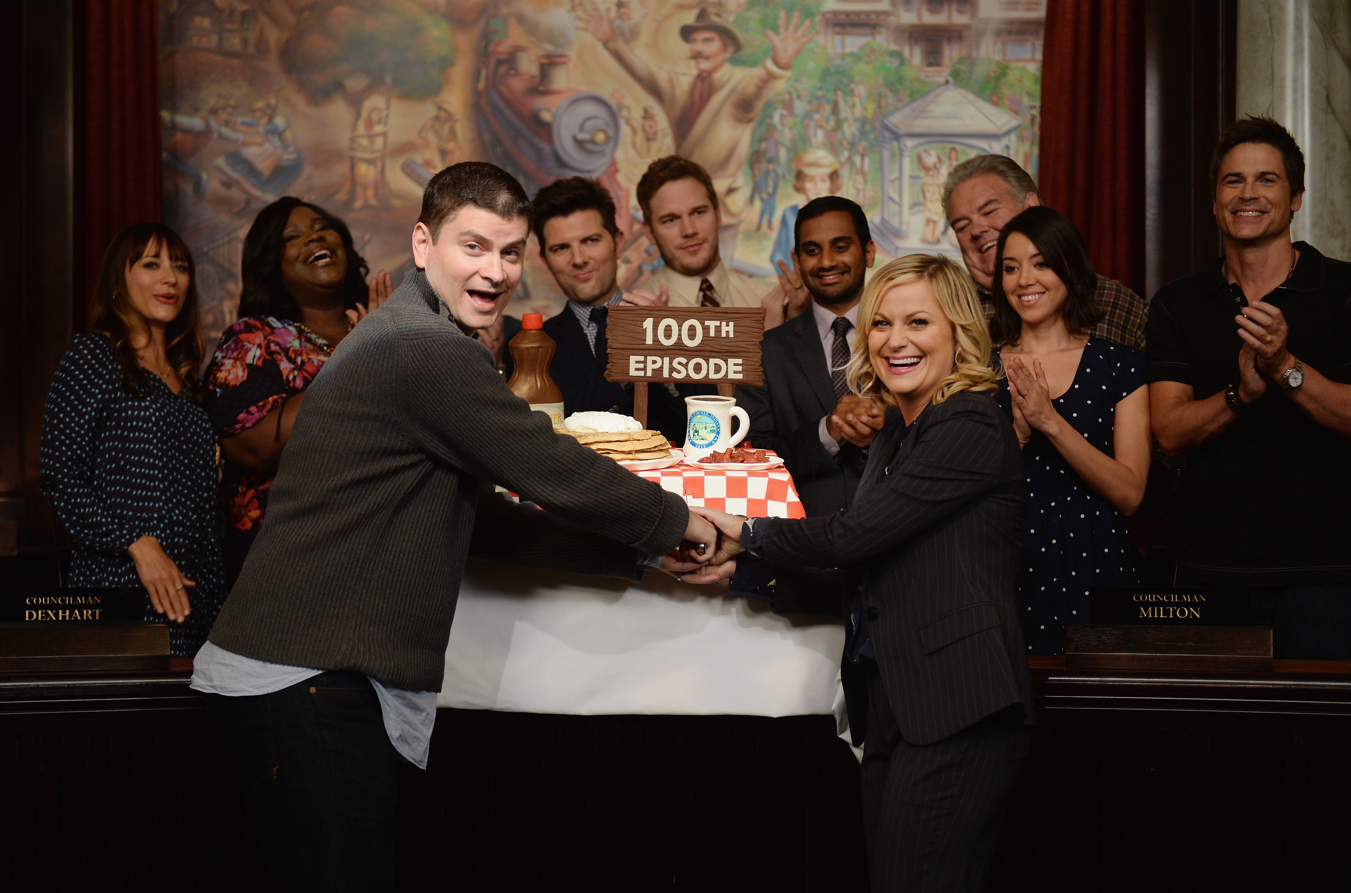 Poehler and Schur, with the cast of ‘Parks and Rec’, celebrating the 100th episode