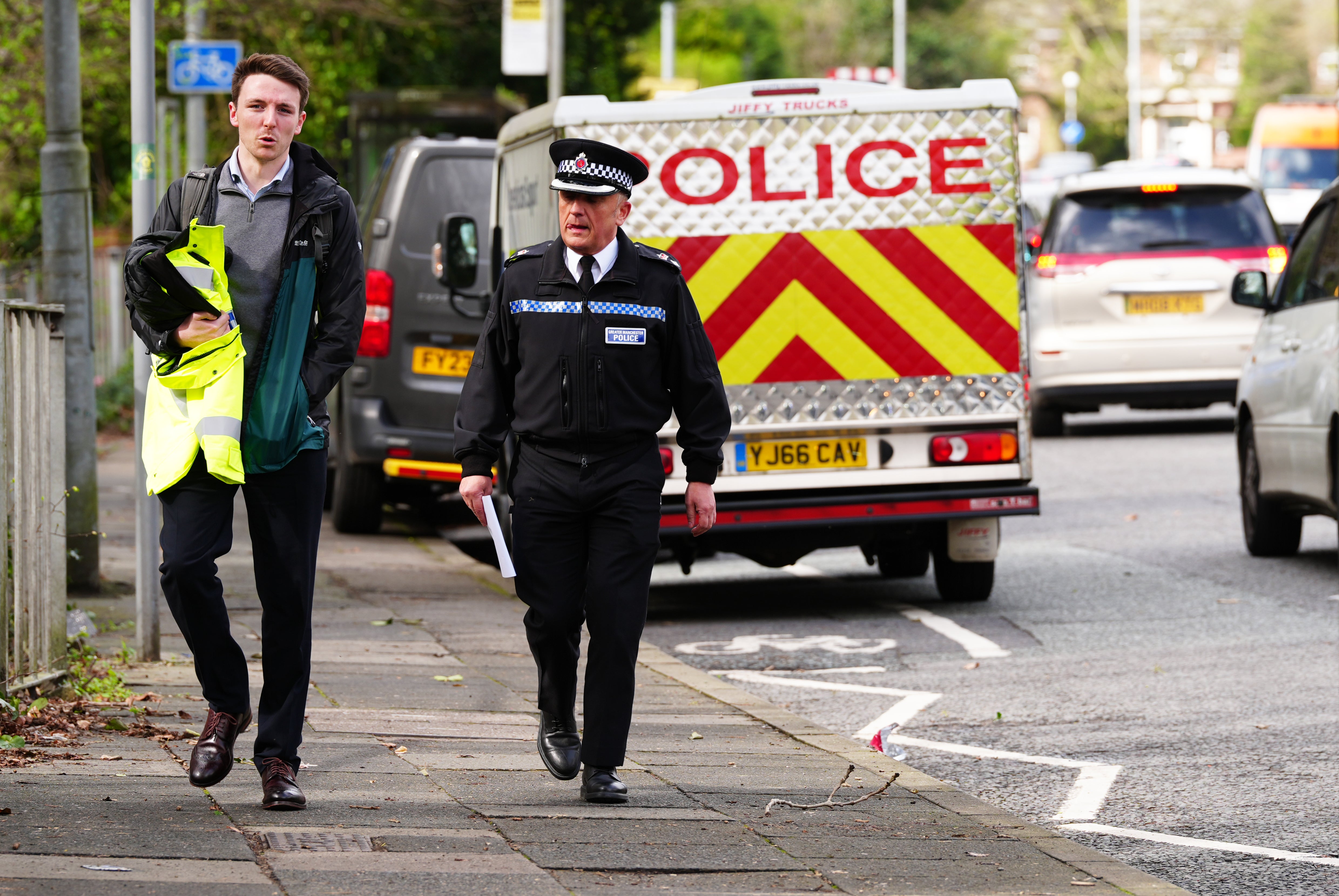 Chief Superintendent Tony Creely (right) arrives to speak to the media after a major search was launched following the discovery of the remains