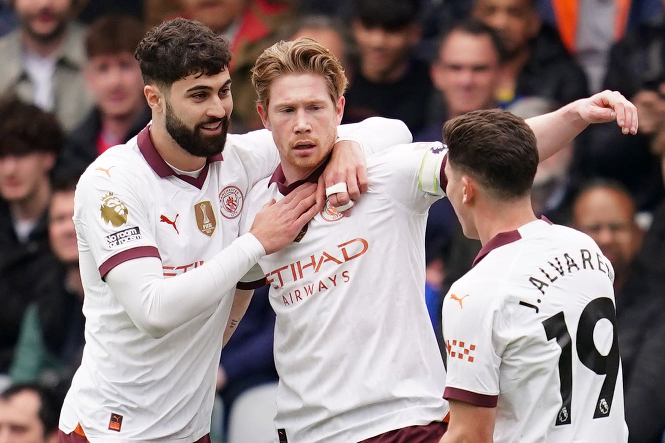 Manchester City’s Kevin De Bruyne, centre, celebrates (Adam Davy/PA)