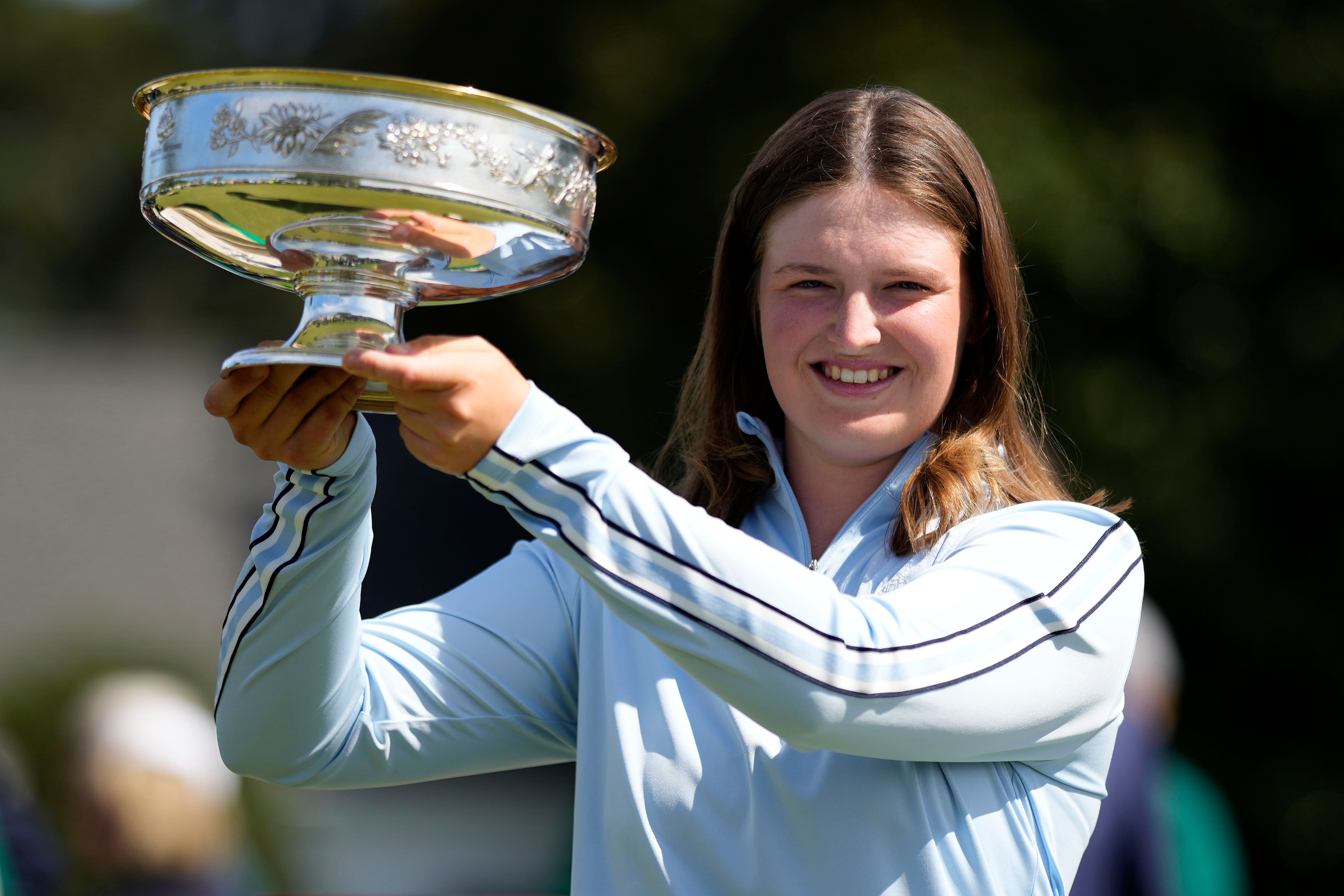 Lottie Woad with the Augusta National Women’s Amateur trophy (Matt Slocum/AP)