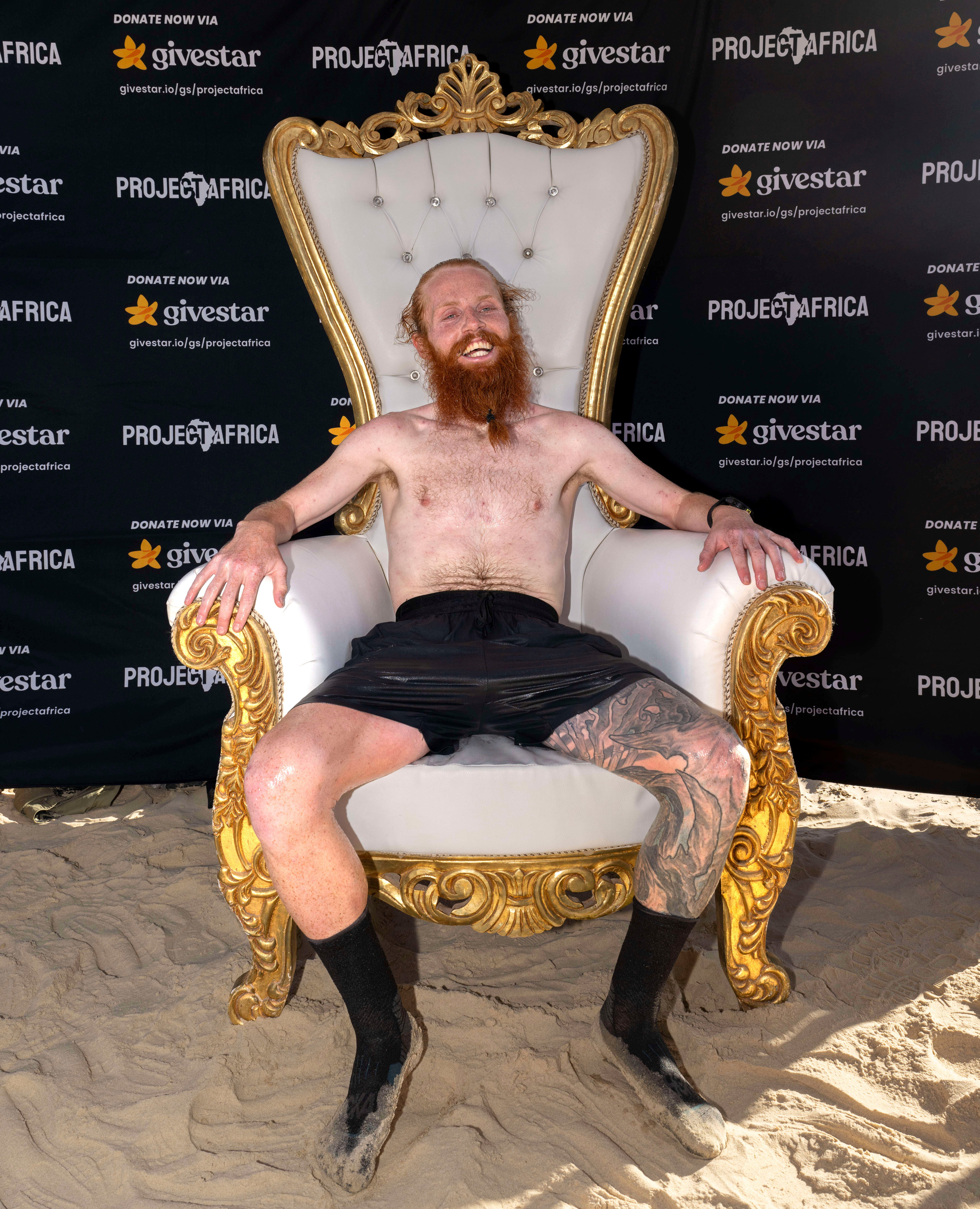 Russ celebrated his victory by sitting on a gold throne.