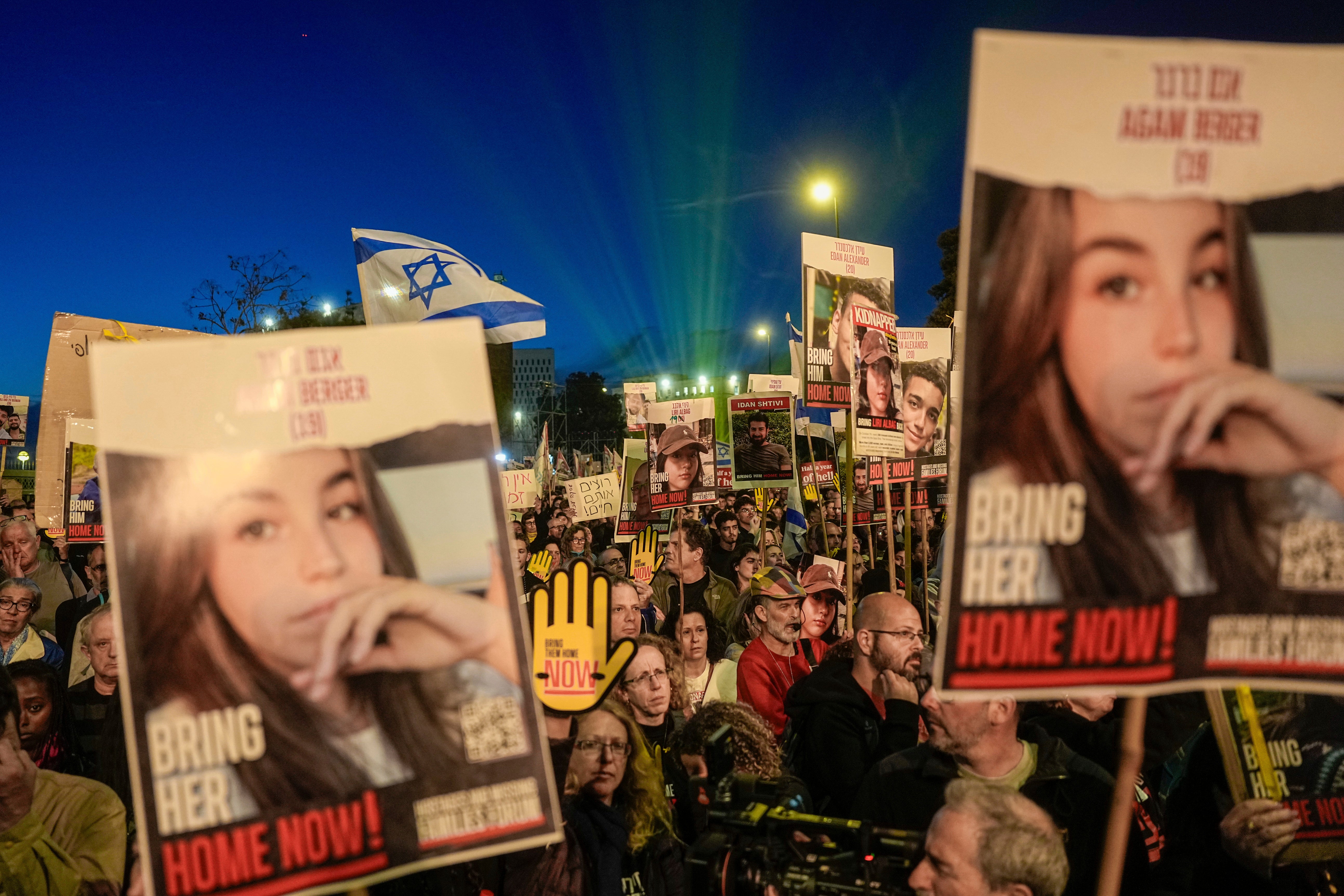 Israeli demonstrators call on the government to secure the release of hostages held in the Gaza Strip by Hamas during a rally