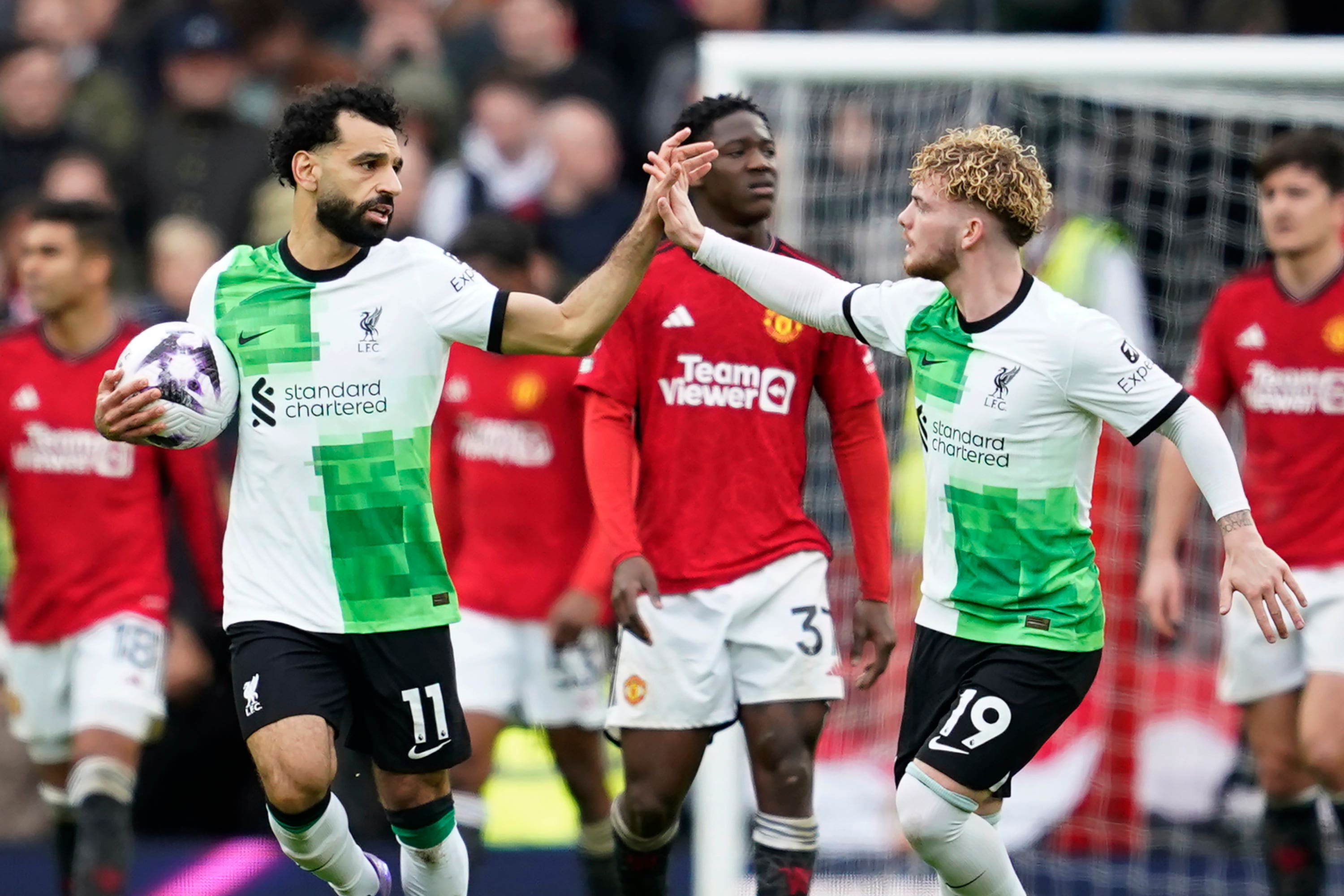 Harvey Elliott, right, won the penalty which Mohamed Salah, left, equalised from (Dave Thompson/AP)