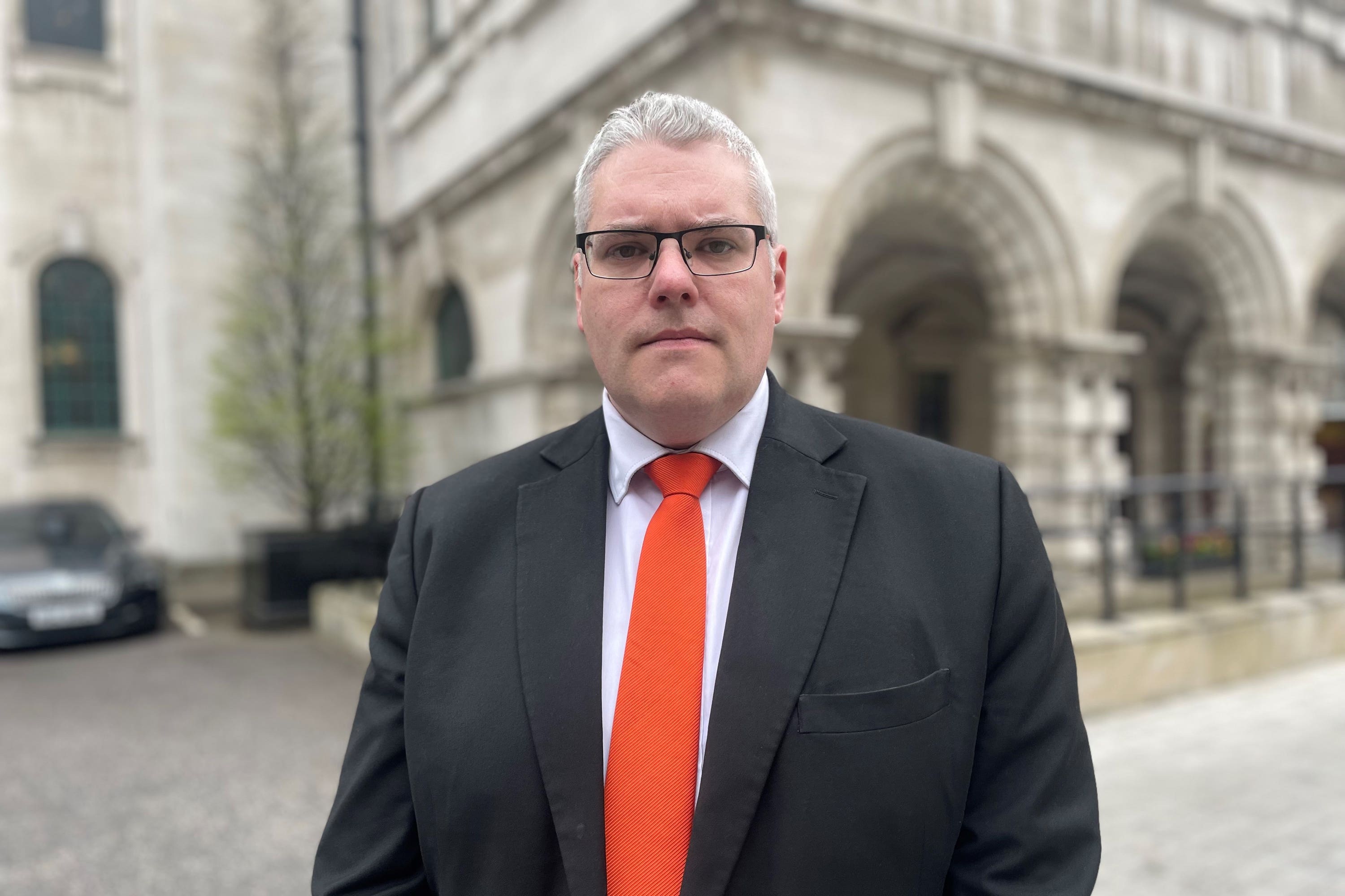 DUP interim leader Gavin Robinson speaks at Belfast City Hall (PA)