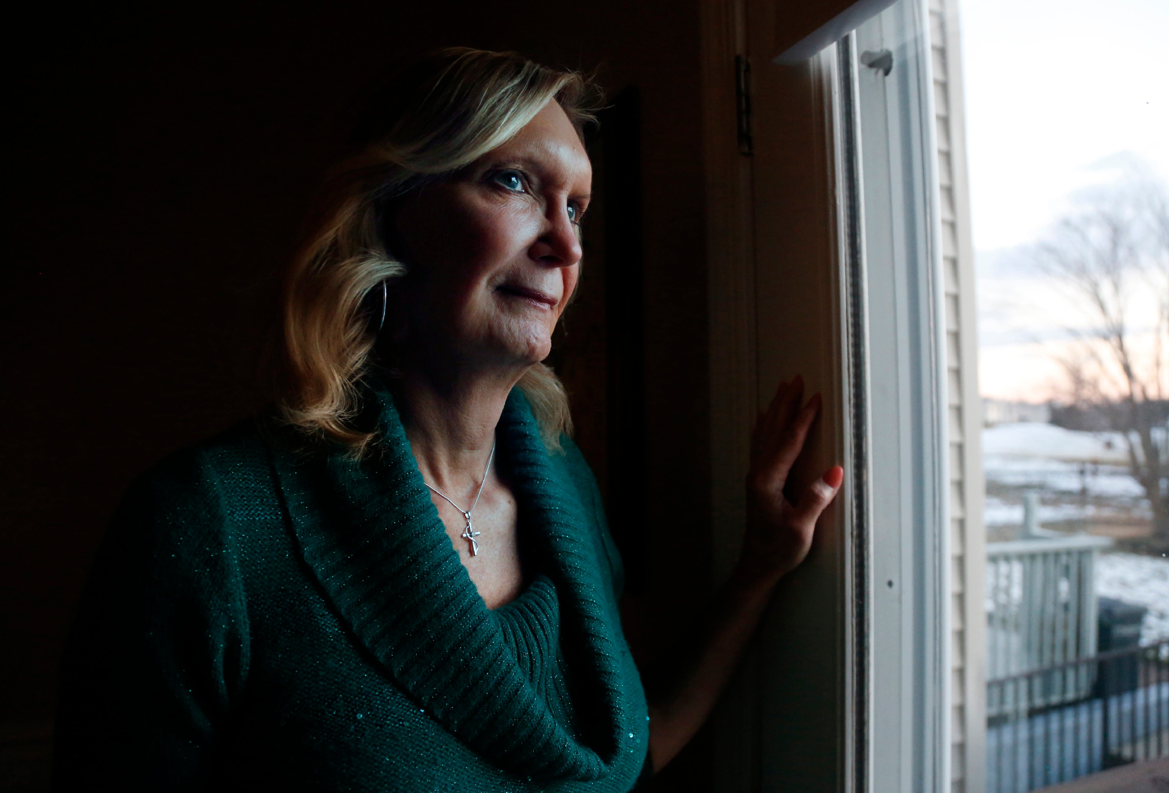 Christine Zuba poses for a portrait at her home in Blackwood, New Jersey, on Monday, Feb. 14, 2022