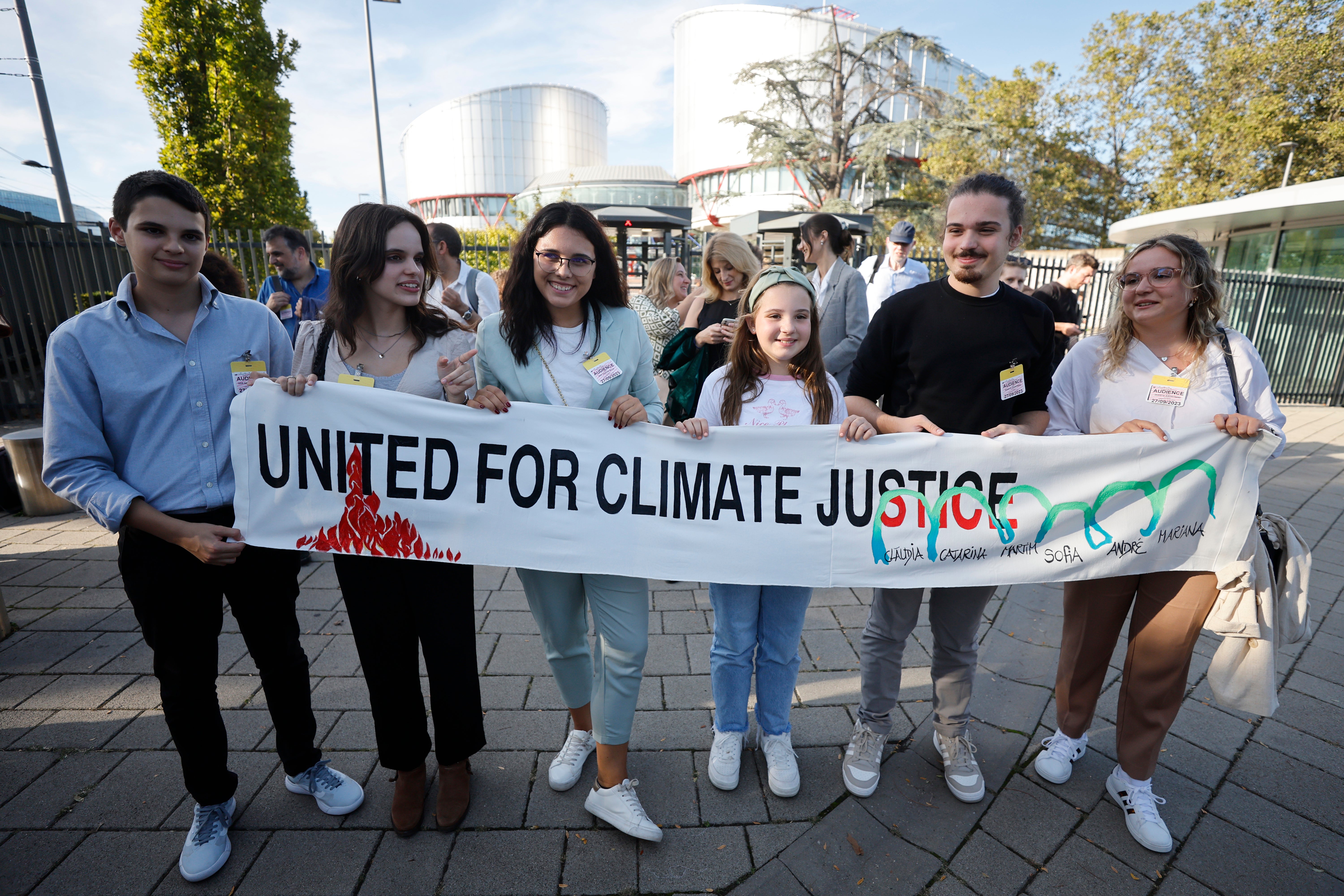 Mariana, center right, Claudia Agostinho, right, Martim Agostinho, second right, Sofia Oliveira, second left