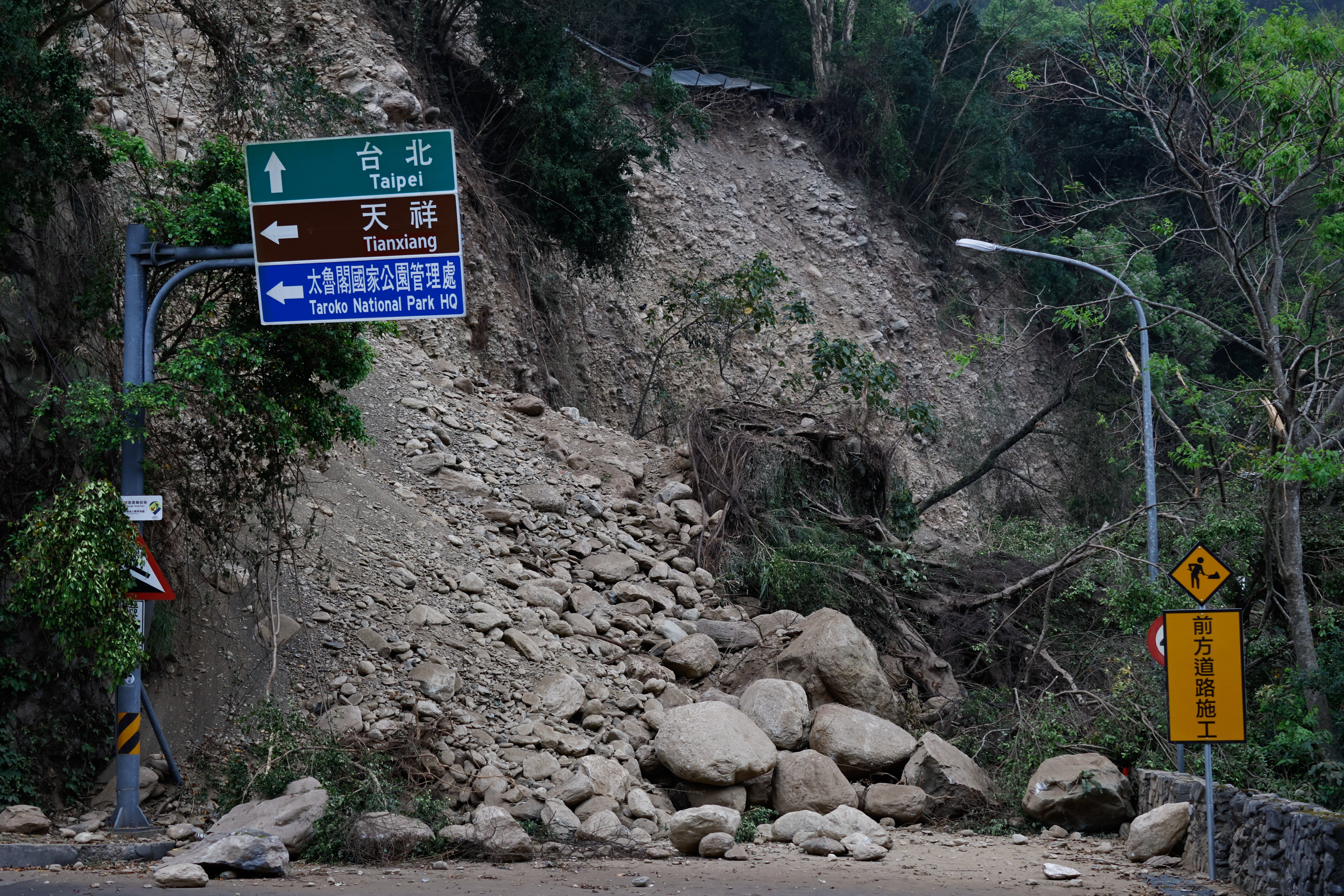 Fallen rocks and debris block a vehicle passage near the Taroko National Park, following earthquake