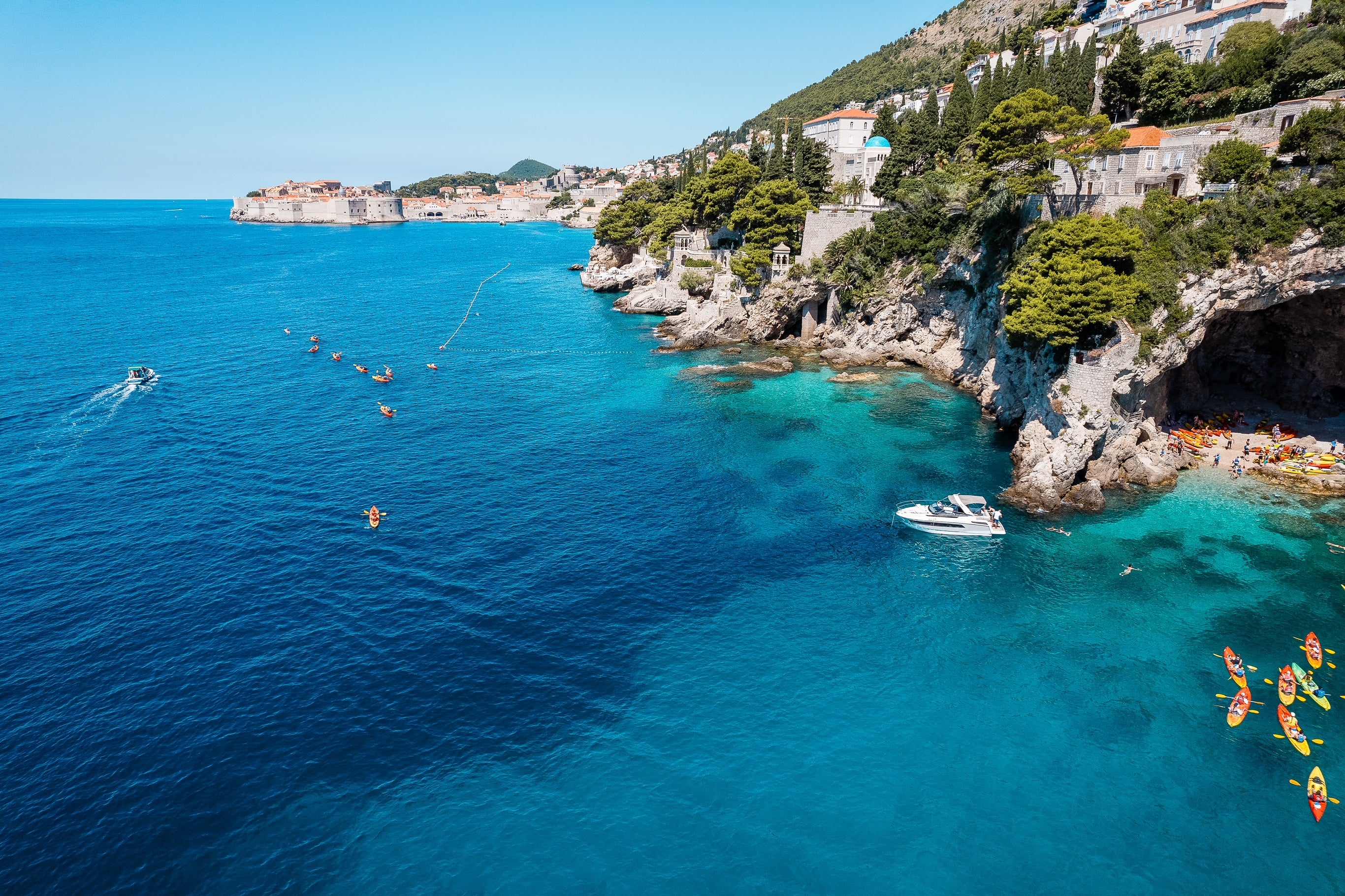 A boat or kayak trip to the secluded Betina cave is another must-experience