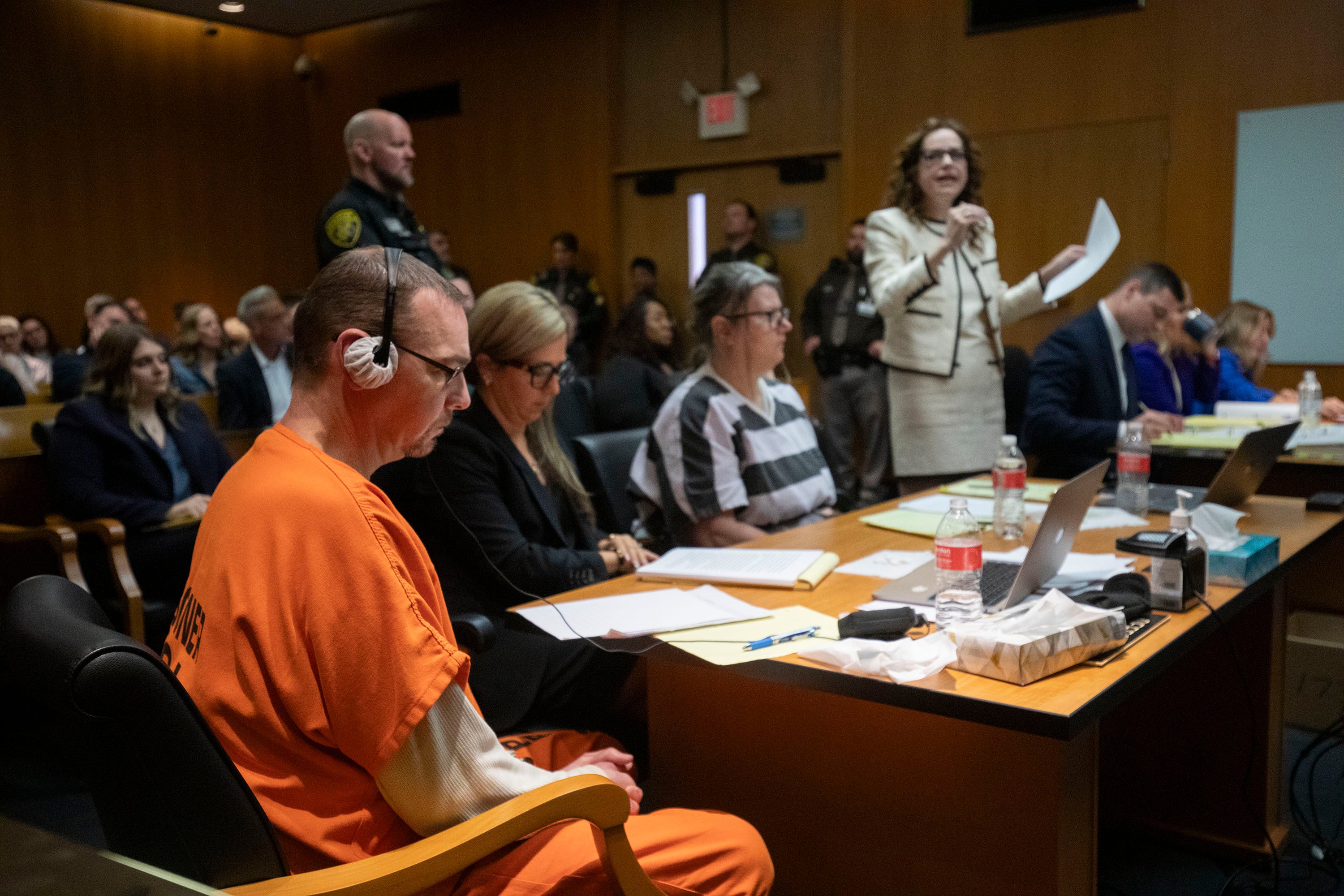 James Crumbley, his attorney Mariell Lehman, Jennifer Crumbley, and her attorney Shannon Smith, sit in court for sentencing on four counts of involuntary manslaughter for the deaths of four Oxford High School students who were shot and killed by the Crumbley parents' son, on April 9, 2024 at Oakland County Circuit Court in Pontiac, Michigan