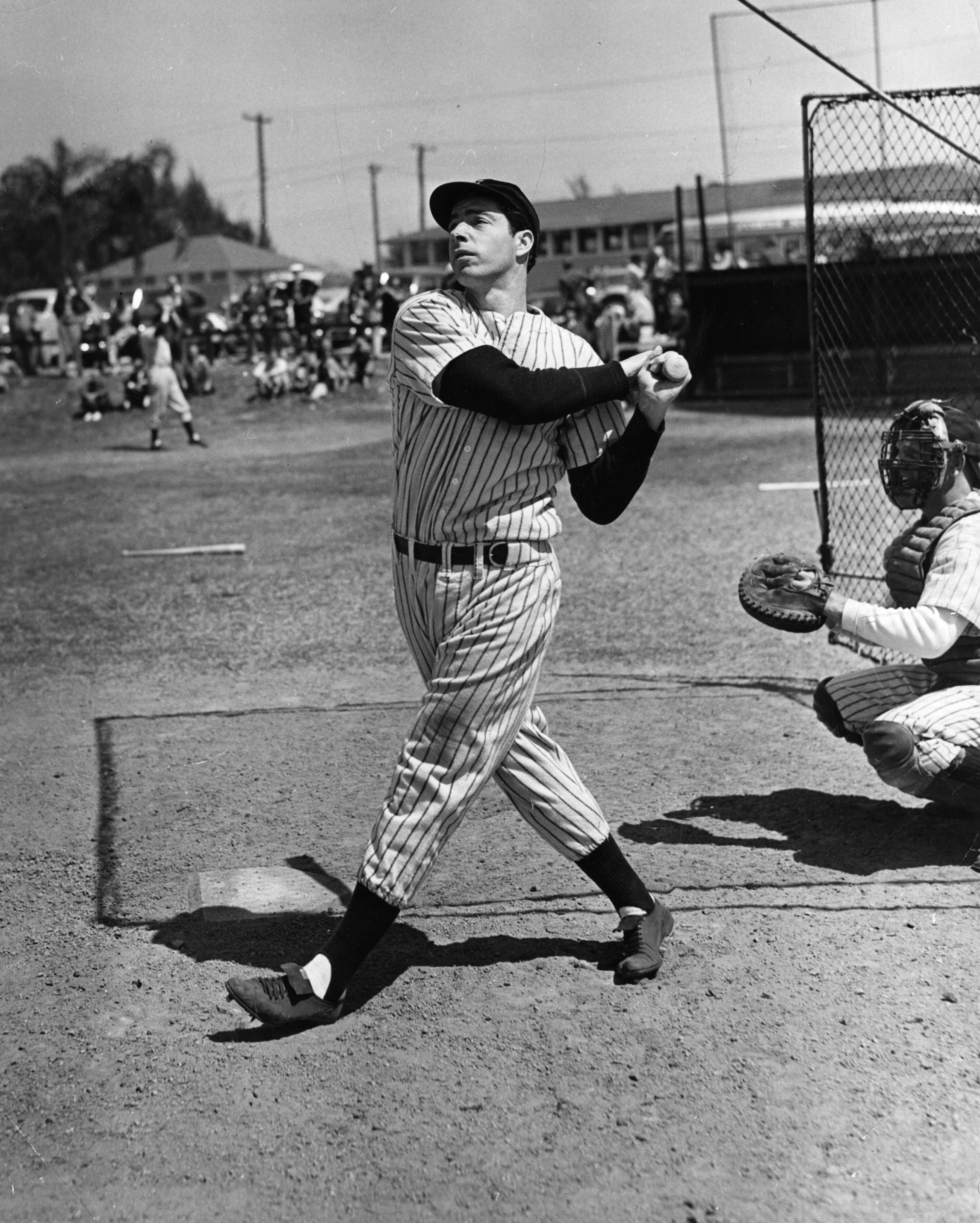 Joe DiMaggio in action in 1948. Giuliani owns a shirt once worn by the New York Yankees legend – although it might be a replica