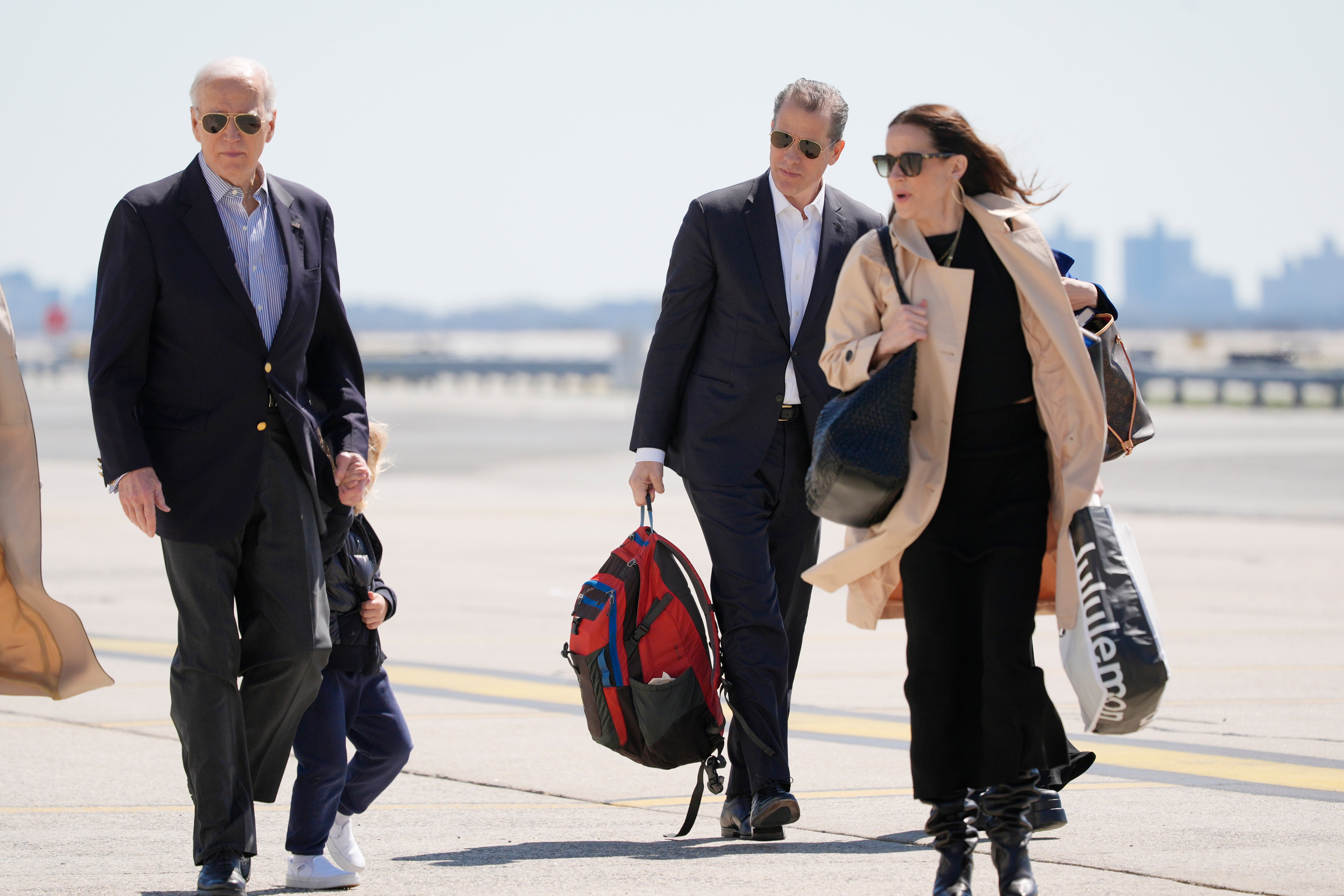 President Joe Biden walks with children Hunter and Ashley. Both Ashley and Hunter have seen personal information fall into the hands of right-wing activists