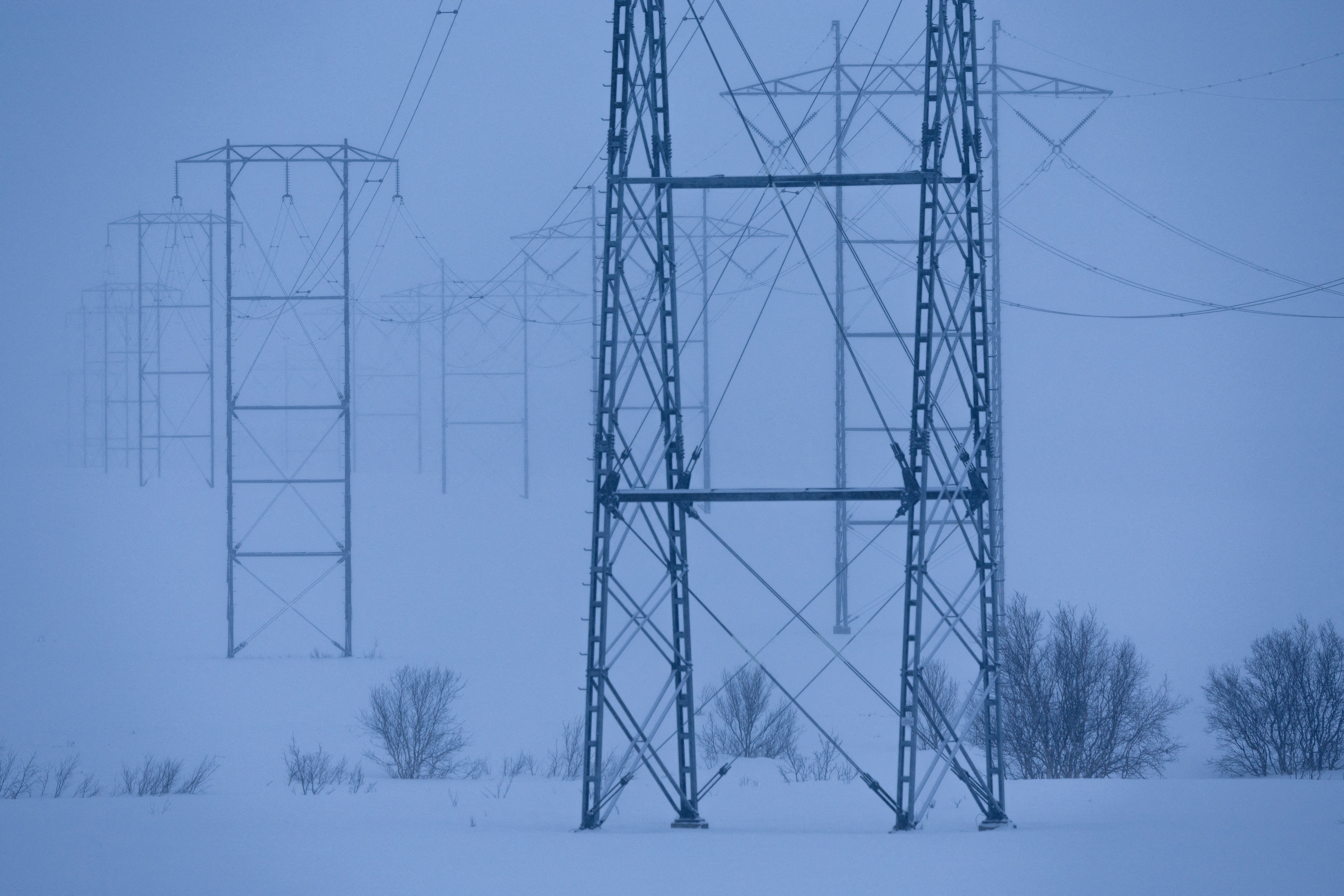 Newly-built power lines and pylons that will transport electricity to Western Europe’s largest liquefied natural gas plant Hammerfest LNG and other parts of Finnmark county stand near the road between Alta and Skaidi