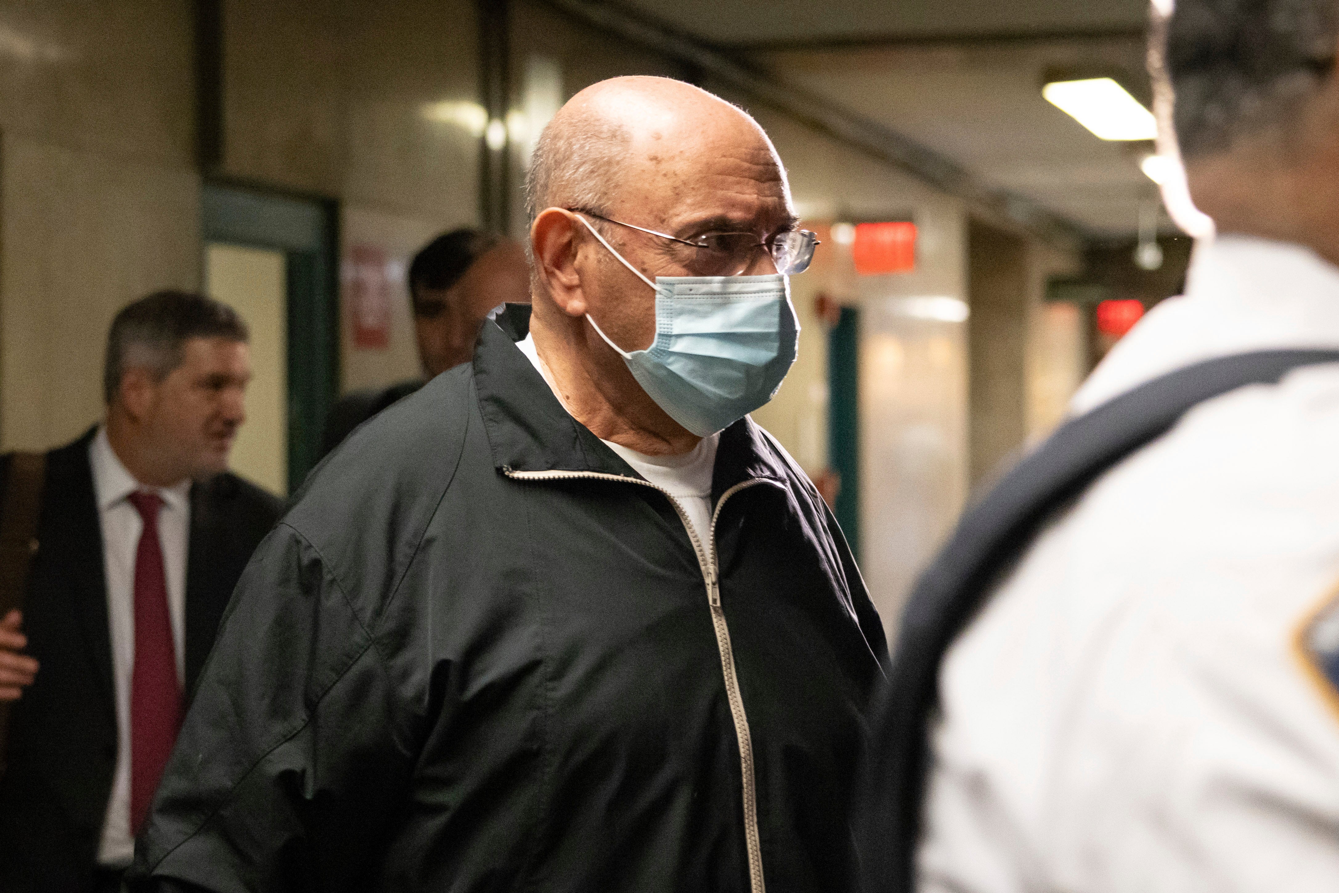 Allen Weisselberg enters Manhattan criminal court on 10 April