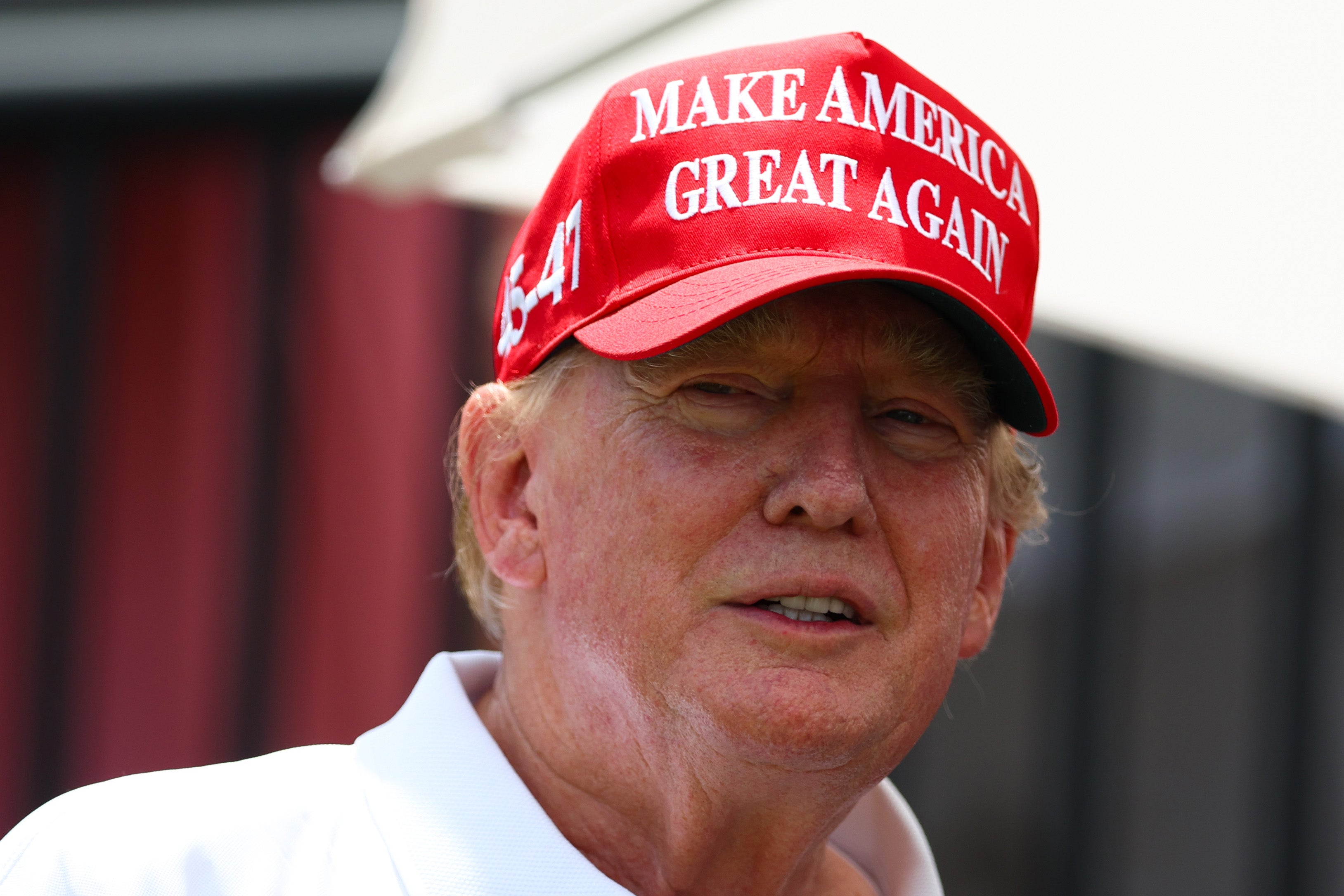 Trump dressed for a round of golf at his Miami Doral club a week before the start of his New York hush money trial in April