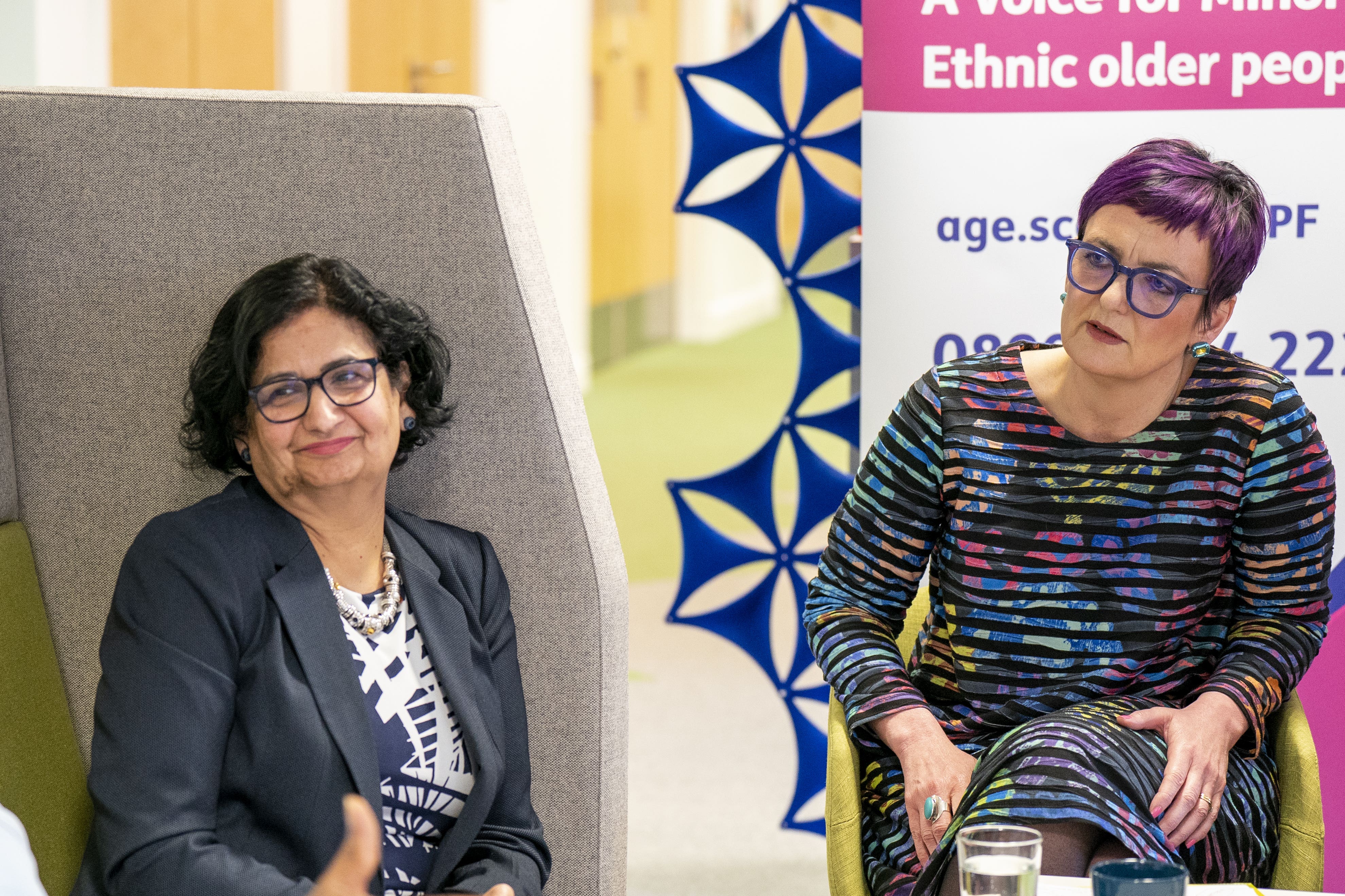 Rohini Sharma Joshi, diversity and inclusion manager at Age Scotland, alongside Justice Secretary Angela Constance (Jane Barlow/PA)