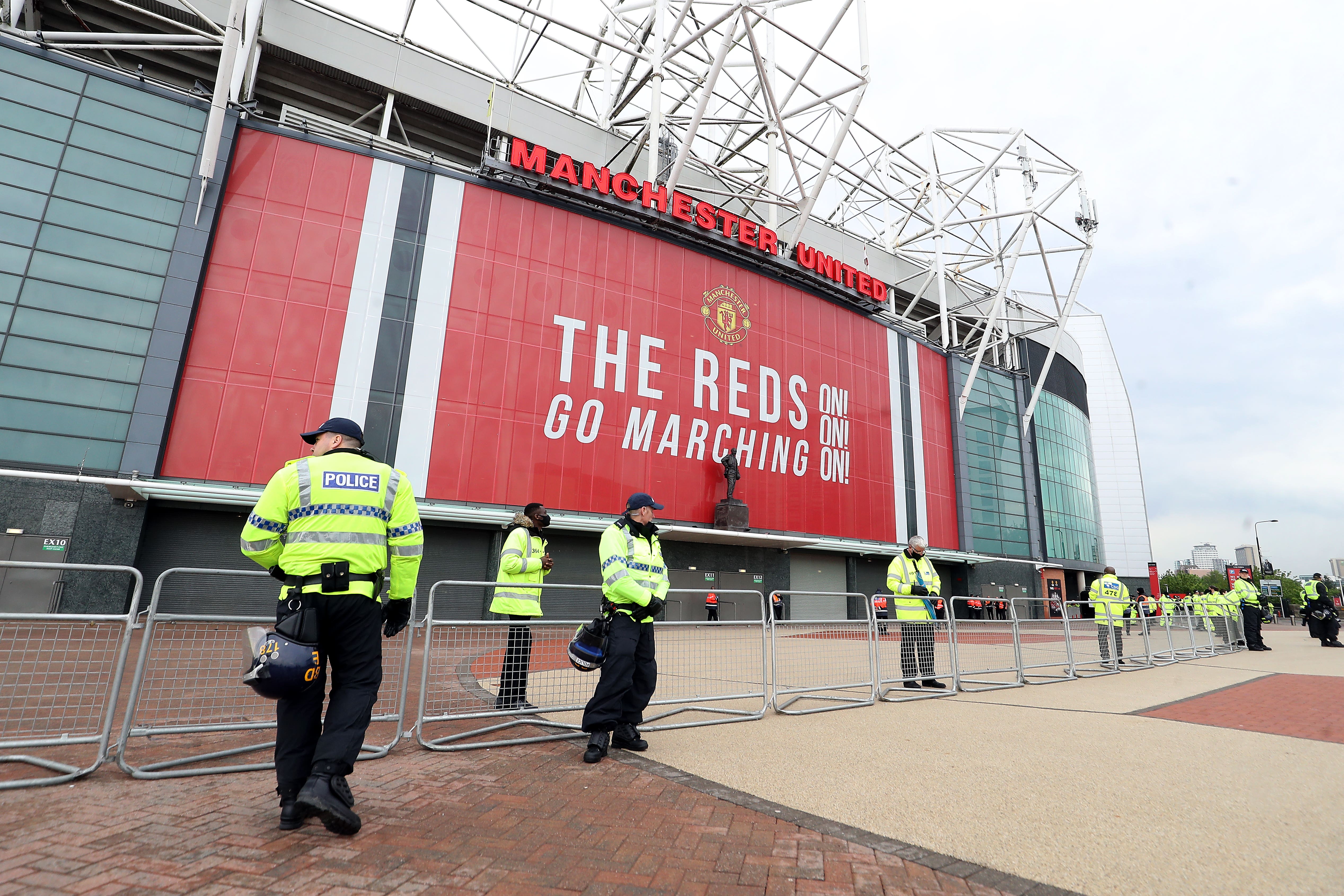 Police presence outside Manchester United’s Old Trafford stadium (PA)