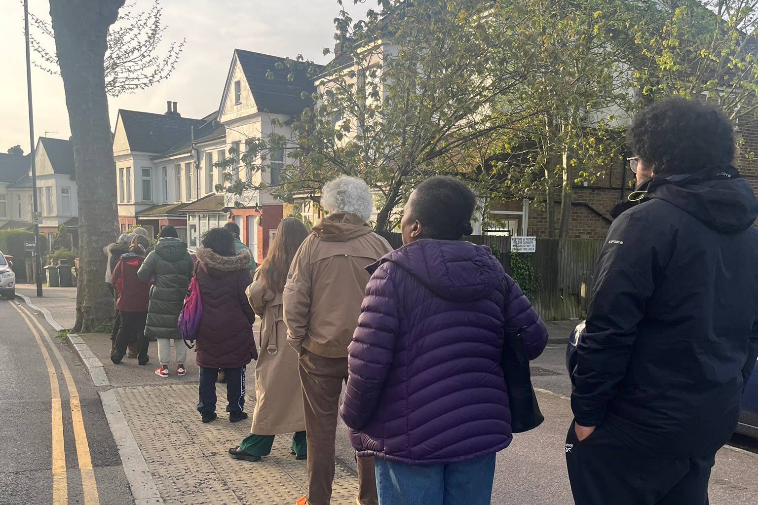 People queuing outside Hilly Fields Medical Centre in Brockley, south London as they tried to get an appointment (Anna-Maria Cahalane/PA)