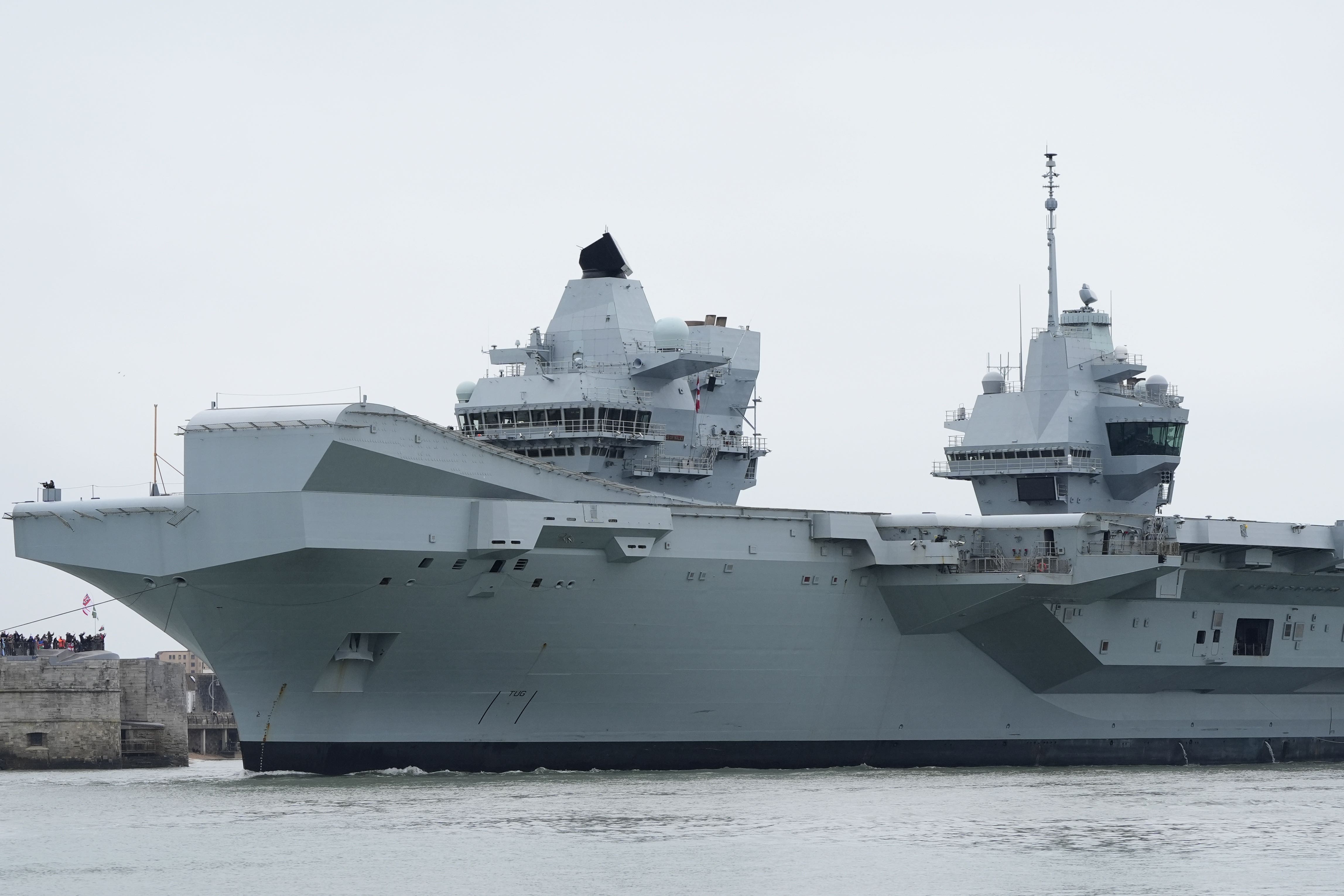 Royal Navy aircraft carrier HMS Prince of Wales will be deployed to the region at the head of a Carrier Strike Group (Andrew Matthews/PA)