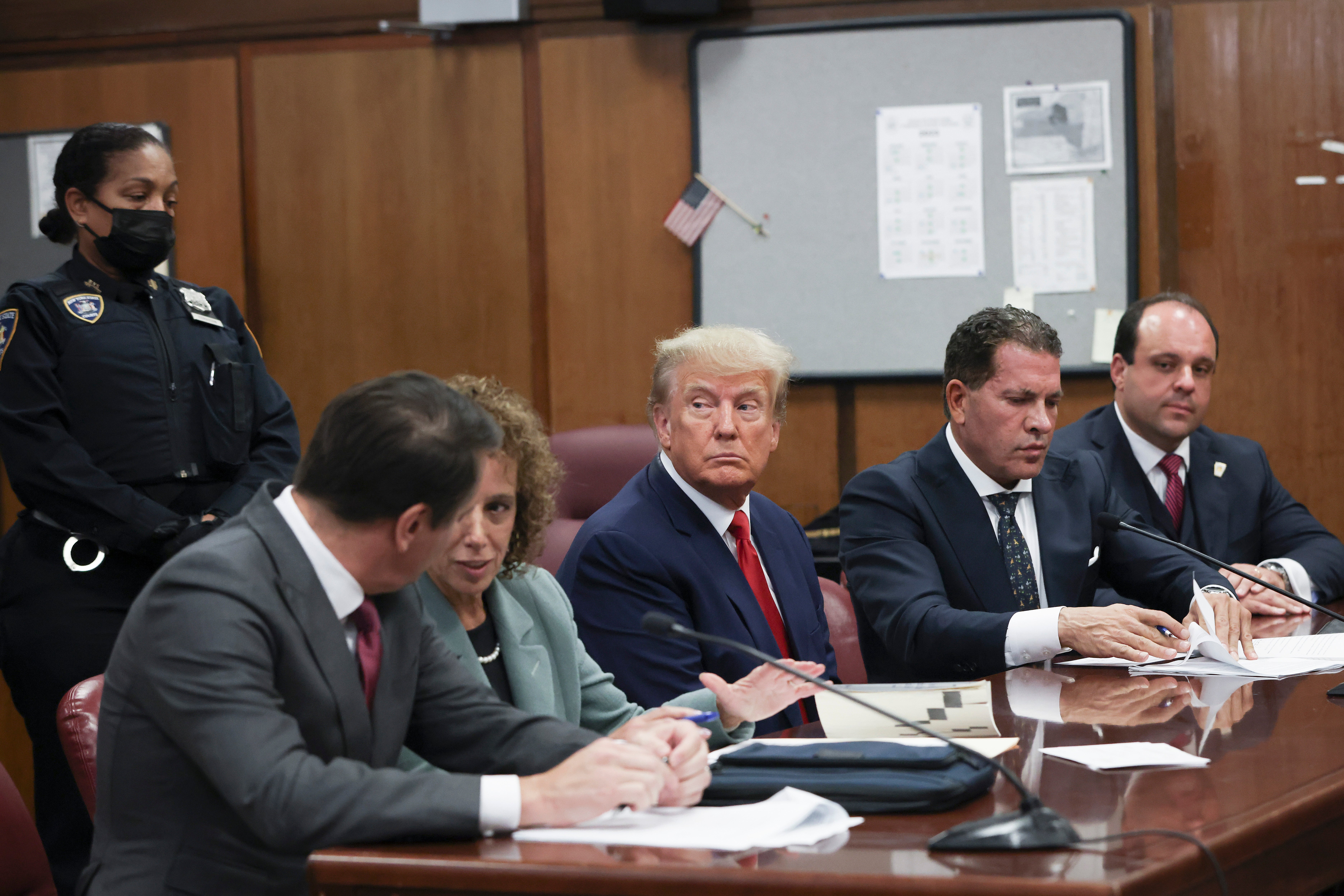 Boris Epshteyn (far right) with Donald Trump during his arraignment in April 2023 in his hush money case