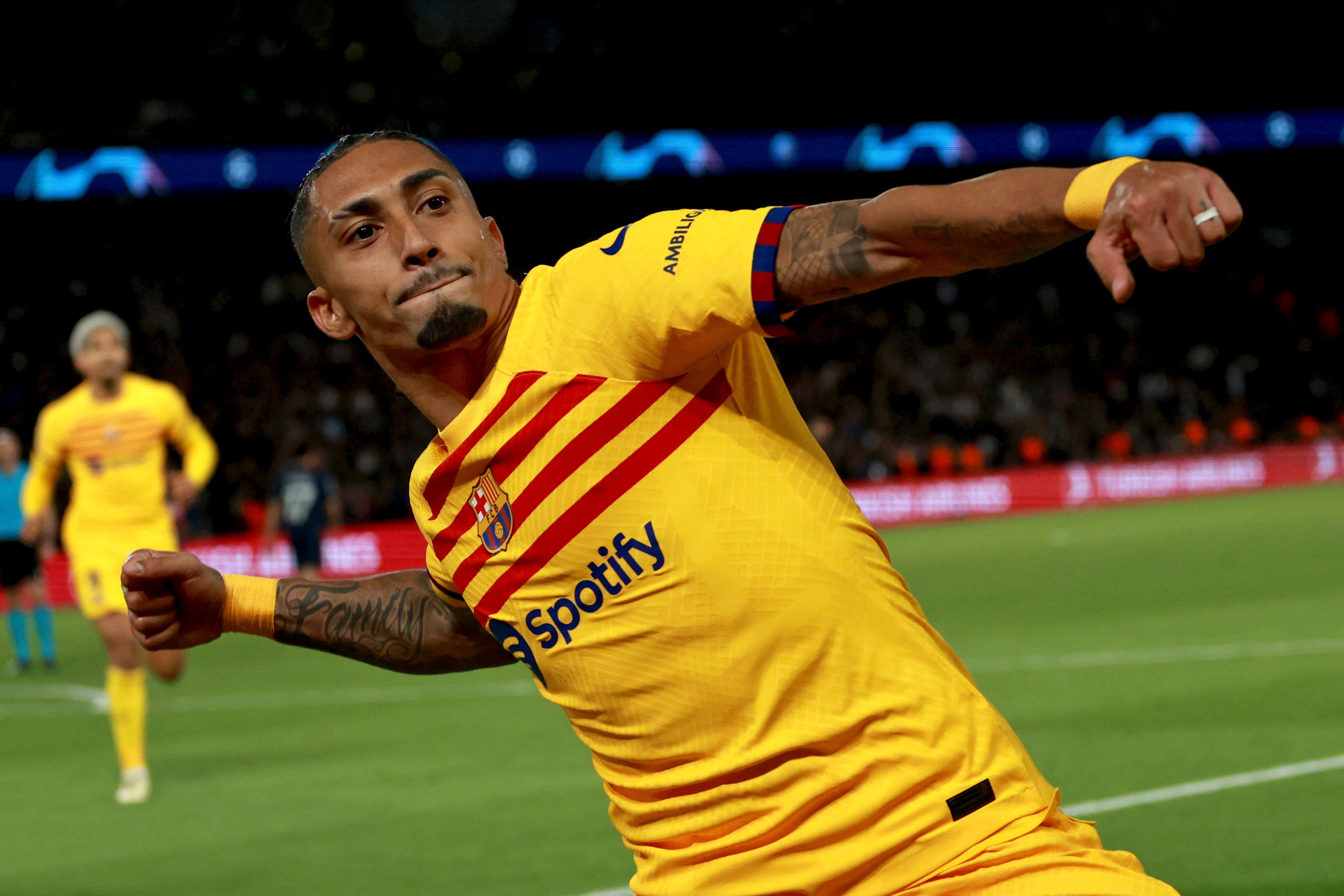 Raphinha celebrates scoring his second goal against Paris Saint-Germain at Parc des Princes (Aurelien Morissard/AP)