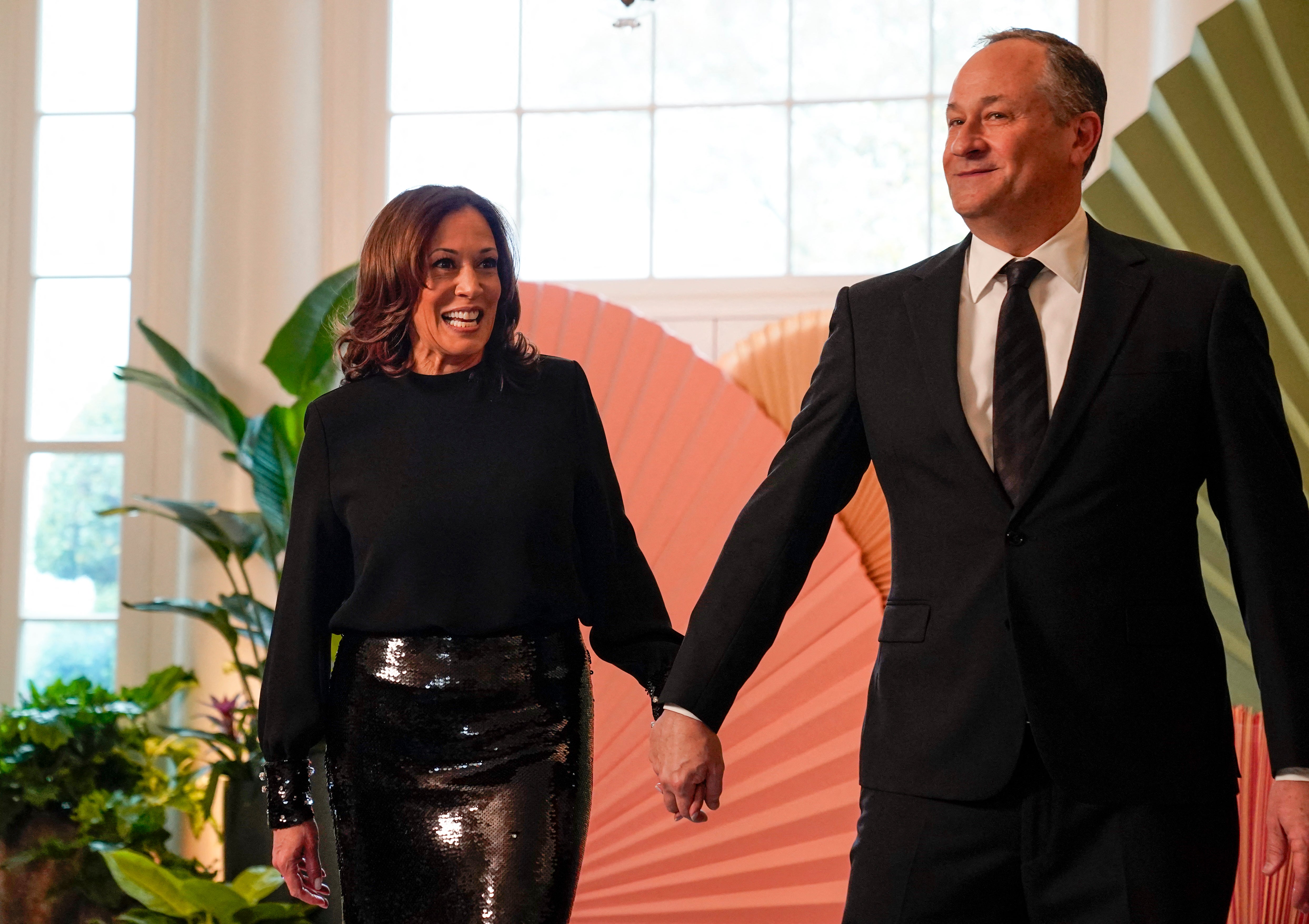 Kamala Harris and second gentleman Doug Hemhoff arrive for a state dinner