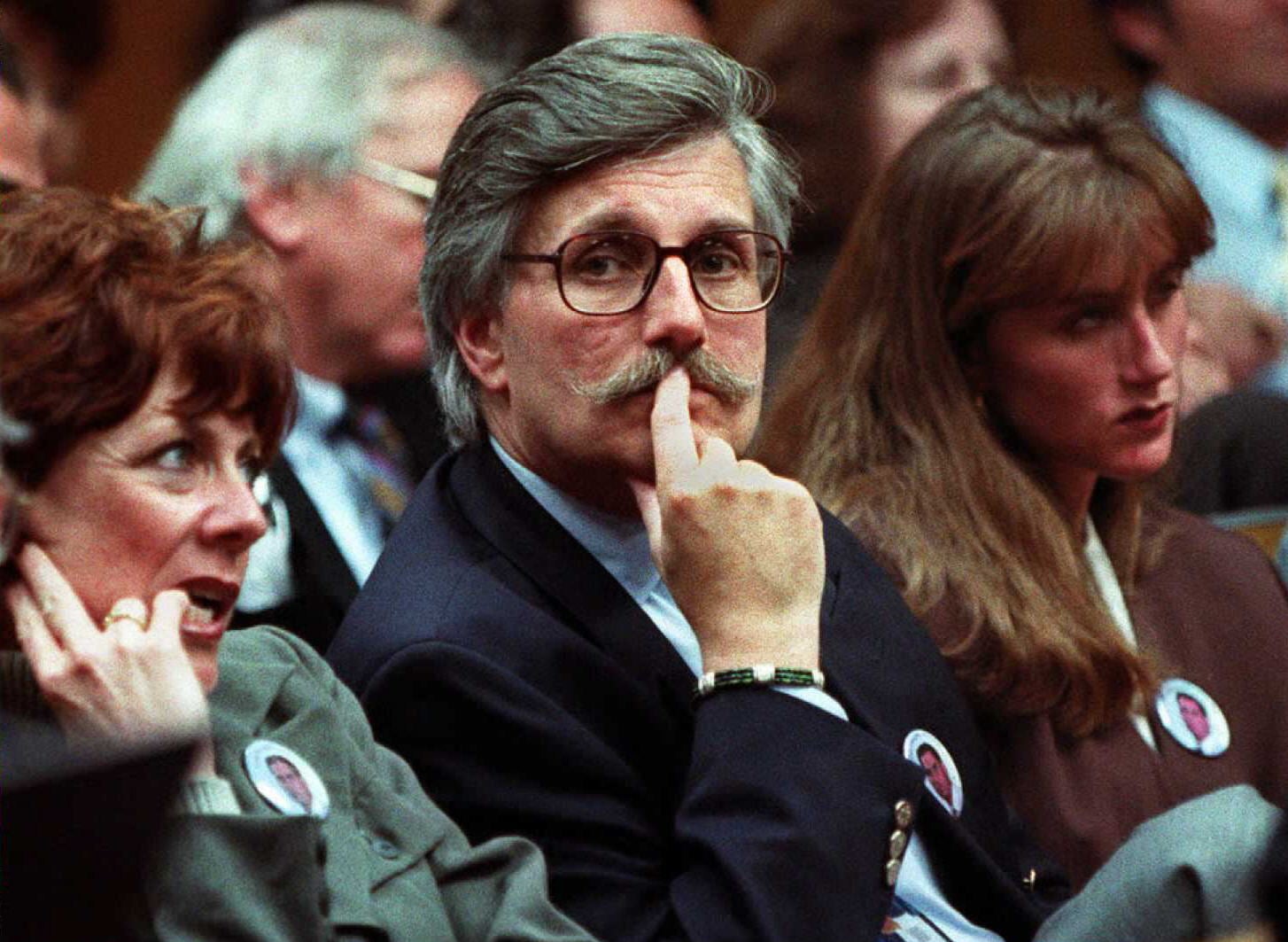 Fred Goldman (centre), wife Pattie (left) and daughter Kim (right) in court during the 1994 murder trial of OJ Simpson, who was later aquitted of the murder of Ron Goldman and Nicole Brown