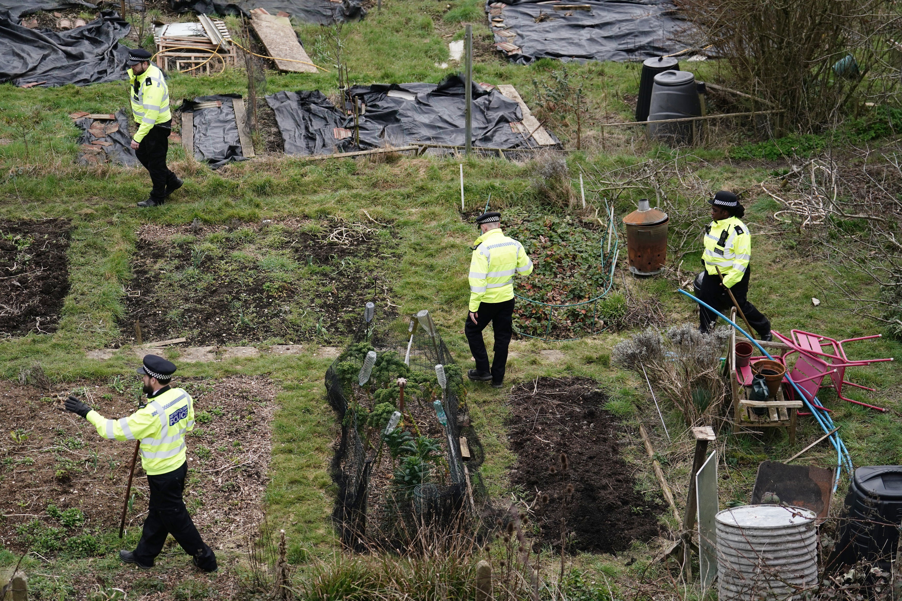 Police search Roedale Valley Allotments, Brighton for the missing infant on 28 February 2023, the day after the couple’s arrest