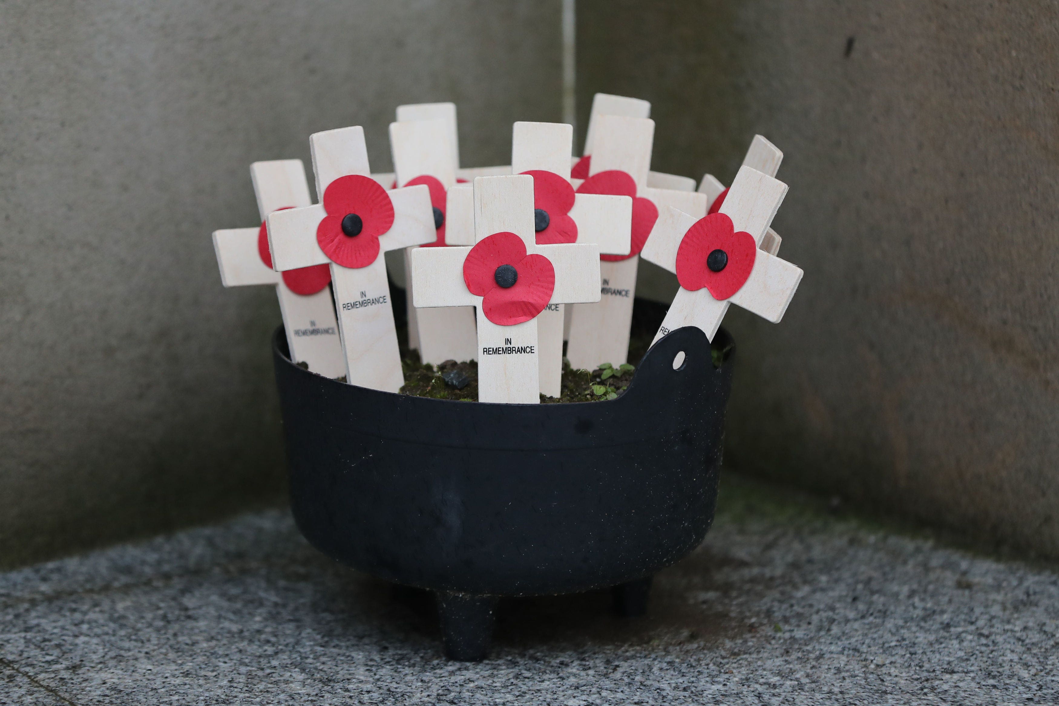 Remembrance crosses at the Kingsmill memorial wall at the scene of the atrocity in Co Armagh (Niall Carson/PA)