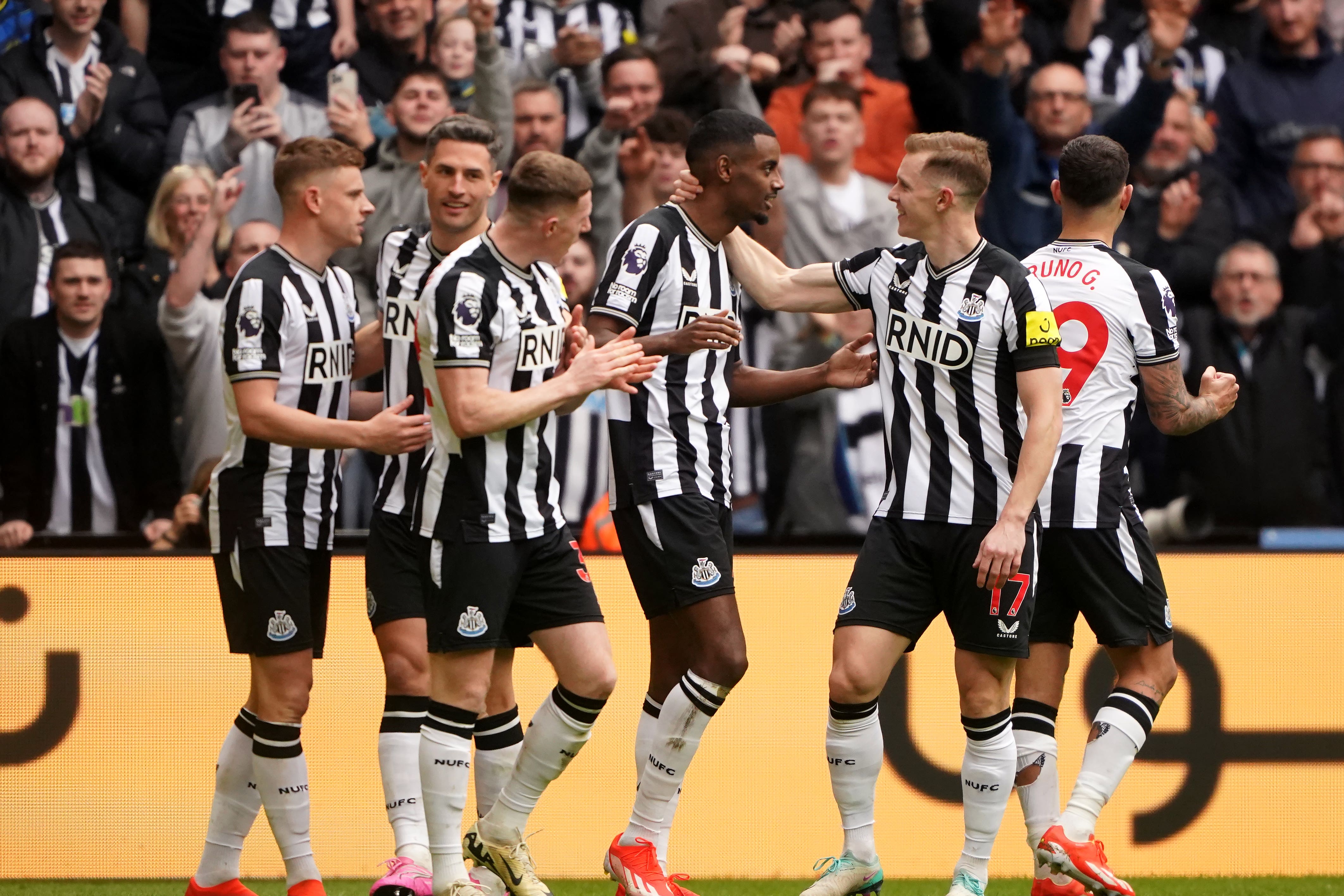 Newcastle’s Alexander Isak (centre) celebrates his second goal against Tottenham (Owen Humphreys/PA)