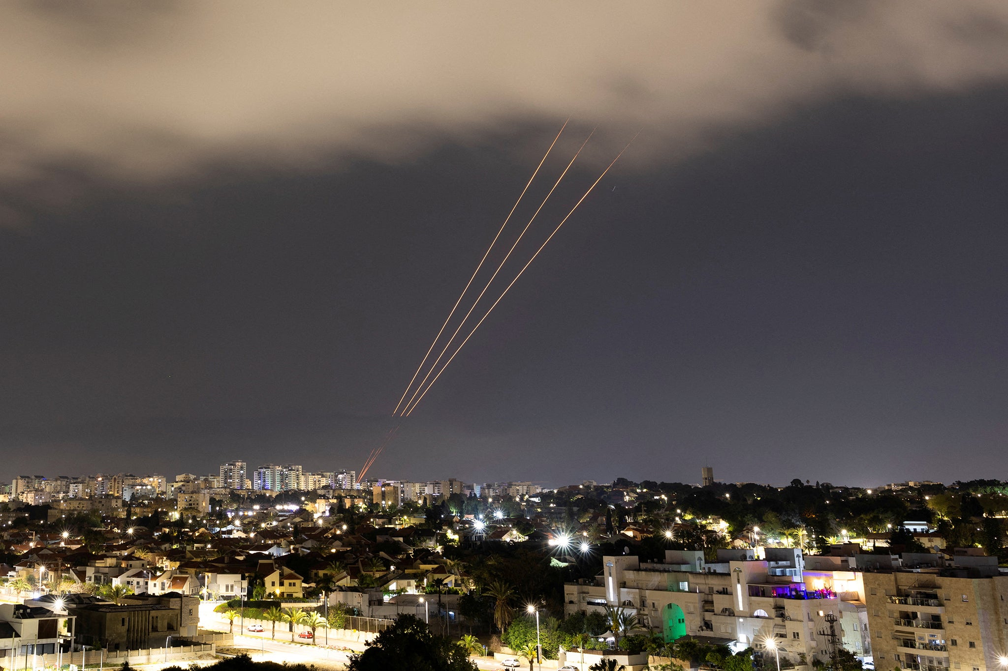 An anti-missile system in action after Iran launched drones and missiles towards Israel