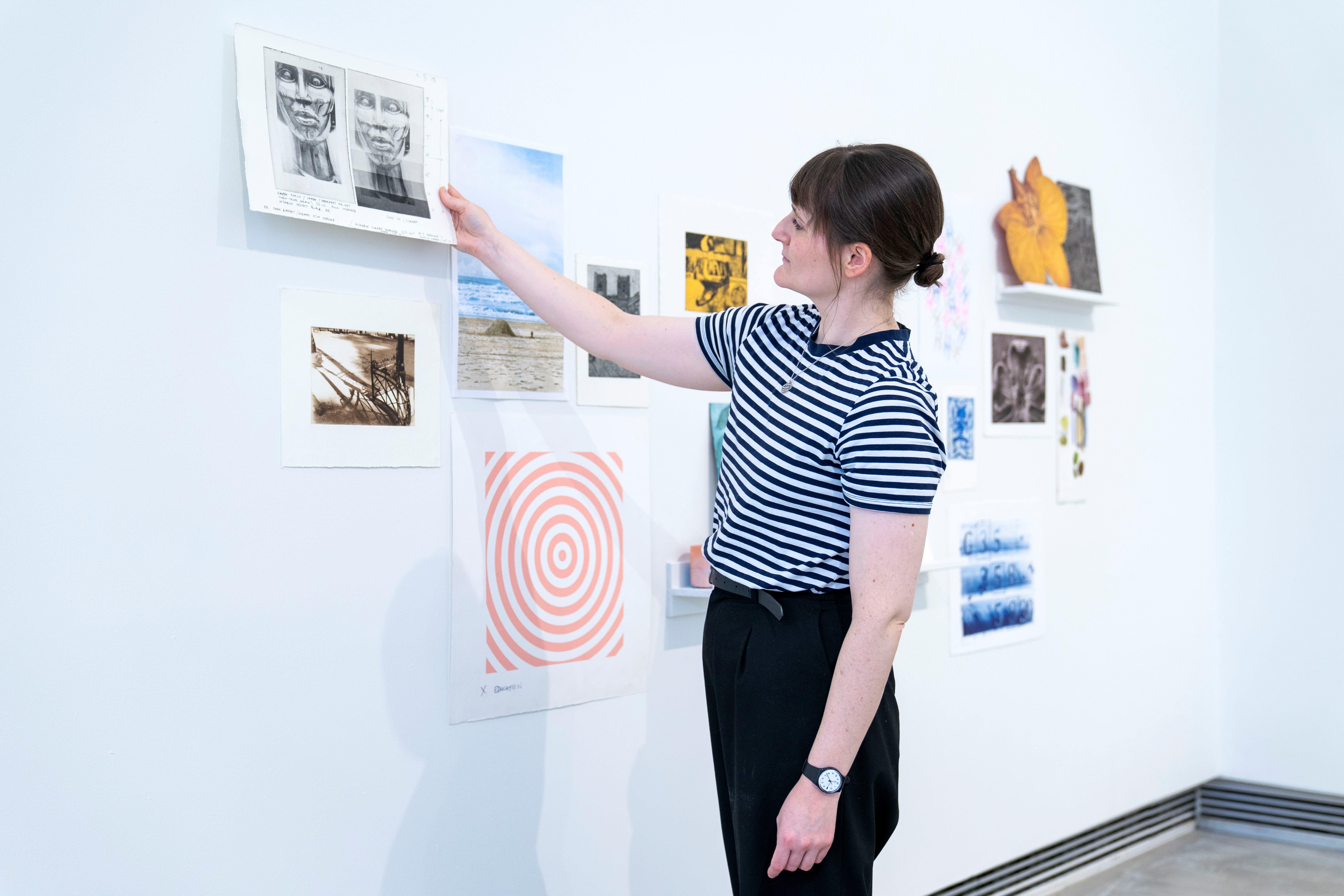 The event invites the public to add their own work to the walls (Jane Barlow/PA Wire).