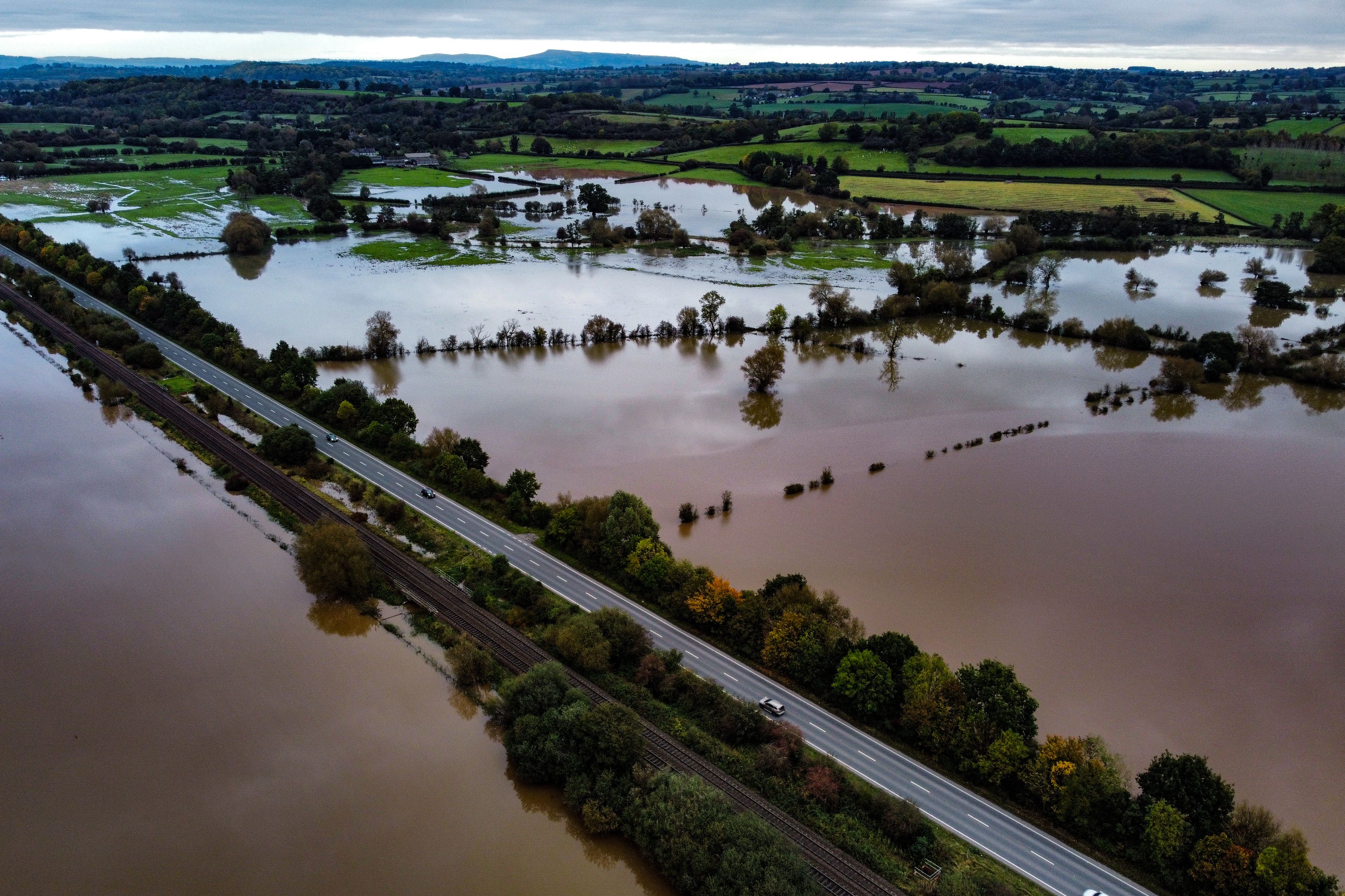 Flooded fields in 2023. Home insurance claims for weather-related damage claims reached a record £573 million last year, according to the Association of British Insurers (Ben Birchall/PA)