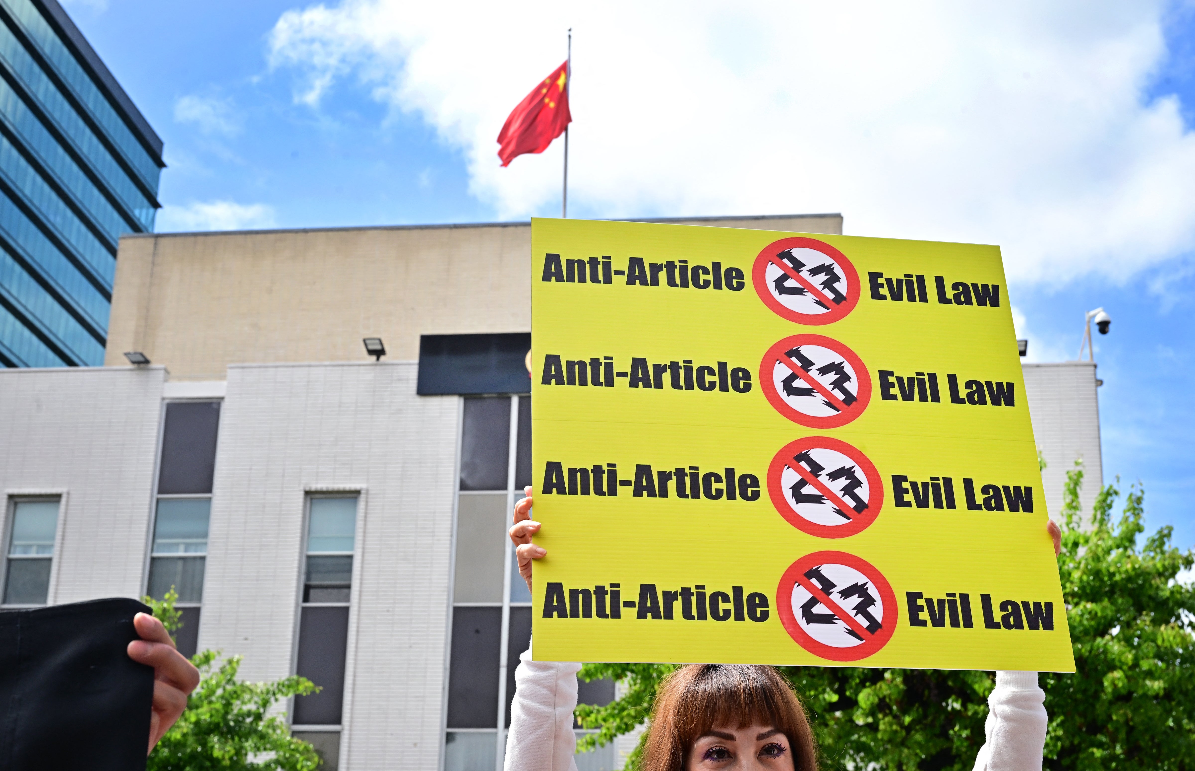 Protesters gather outside a Chinese consulate in Los Angeles to protest against Hong Kong’s new national security law