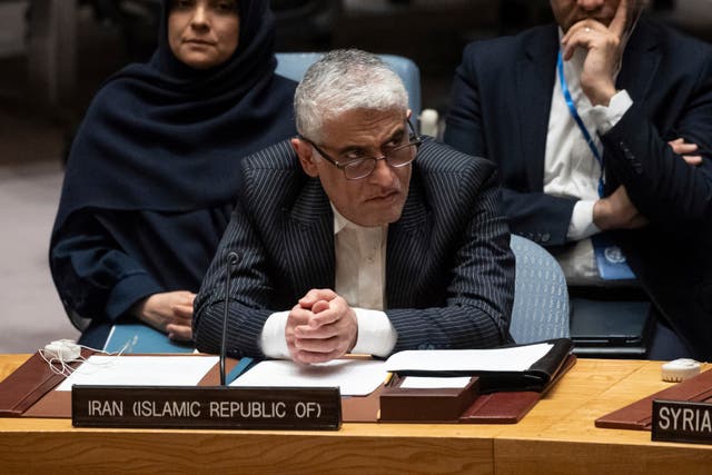 <p>Iran’s UN ambassador, Amir Saeid Iravani, listens at an emergency meeting in the United Nations Security Council chamber</p>