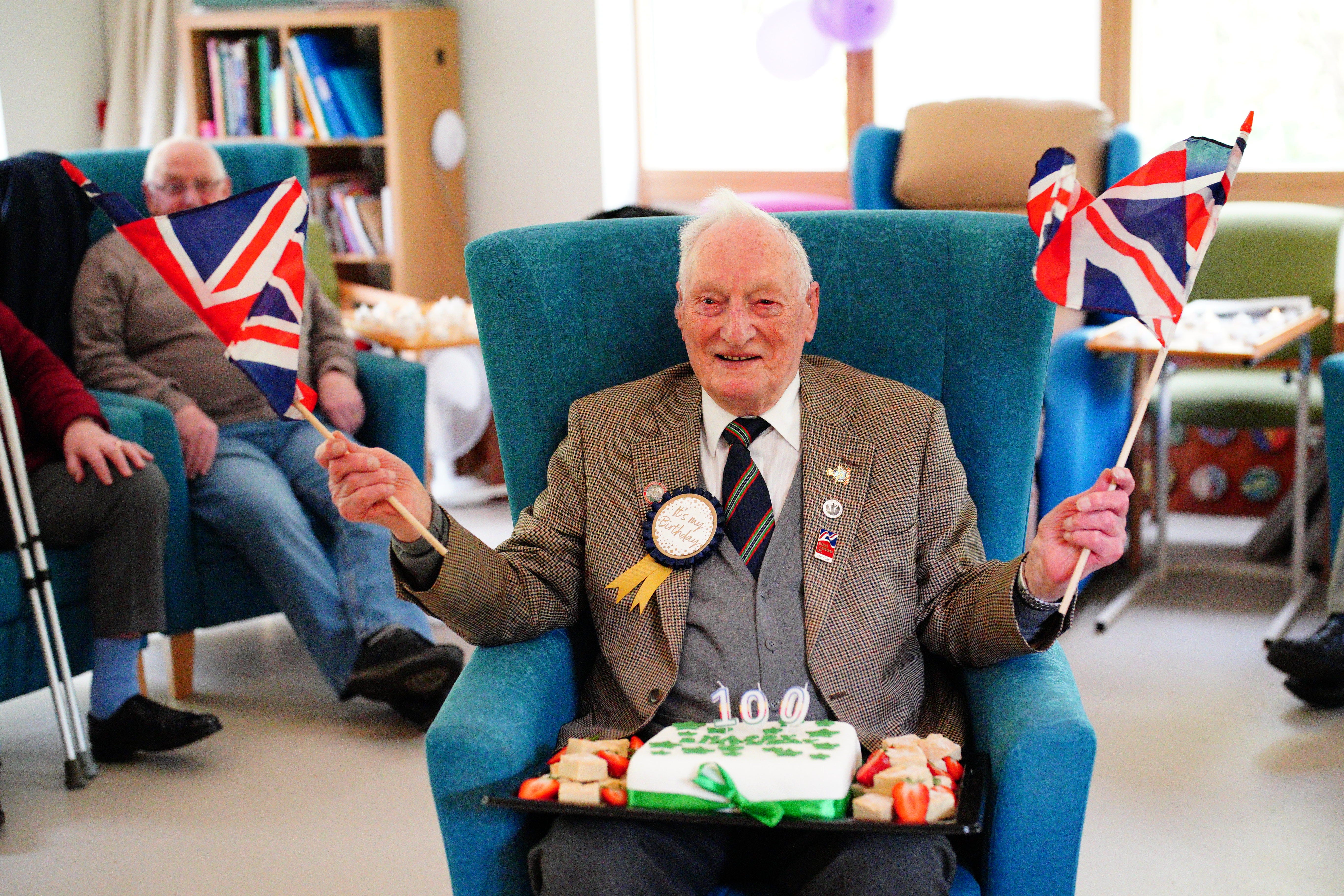 Former Second World War squadron leader and Royal Air Force fighter pilot Derrick Grubb marked his 100th birthday with a party (Ben Birchall/PA)