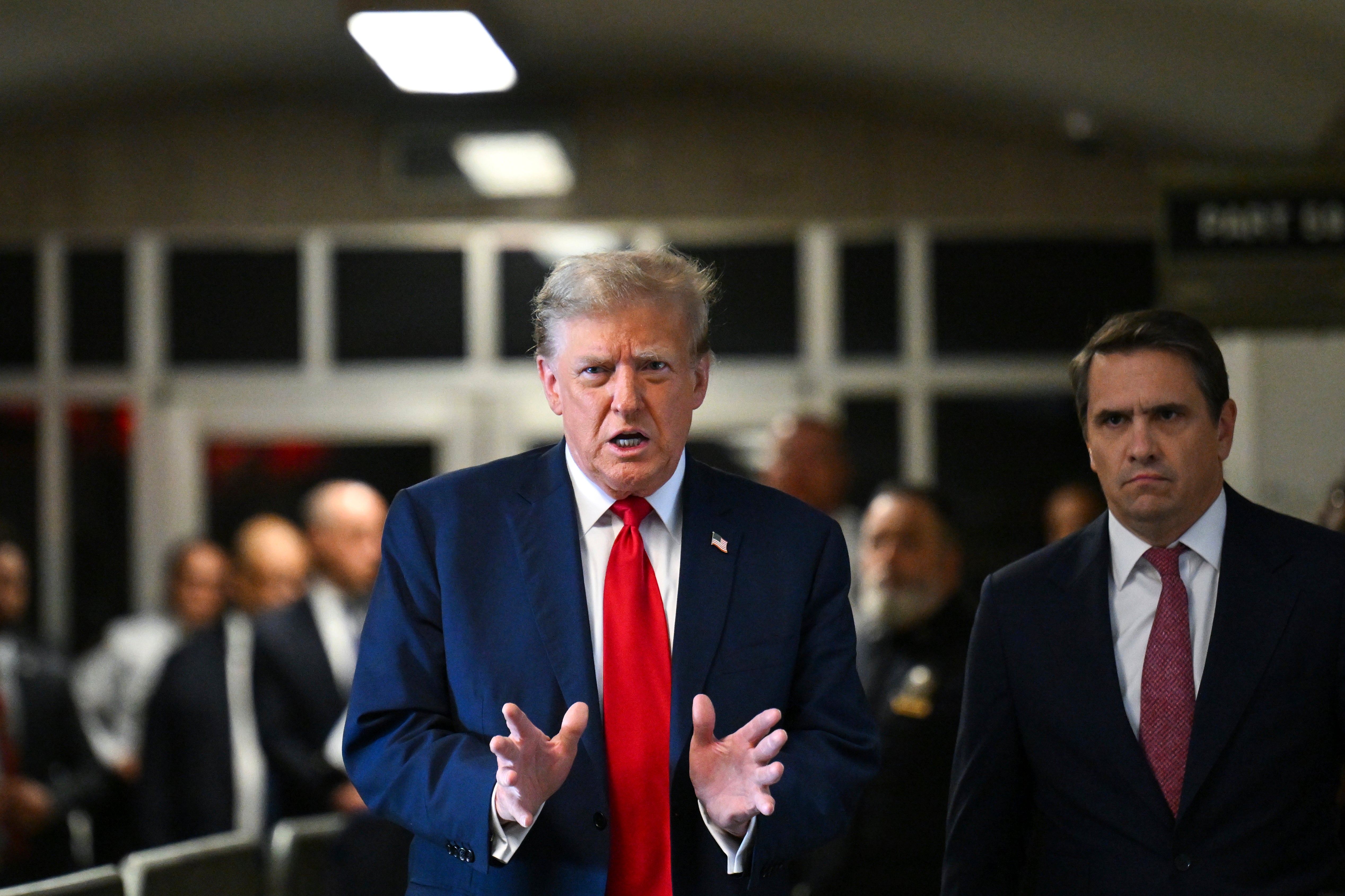 Donald Trump blames his political enemies and slams the criminal case as he holds an impromptu press conference outside court