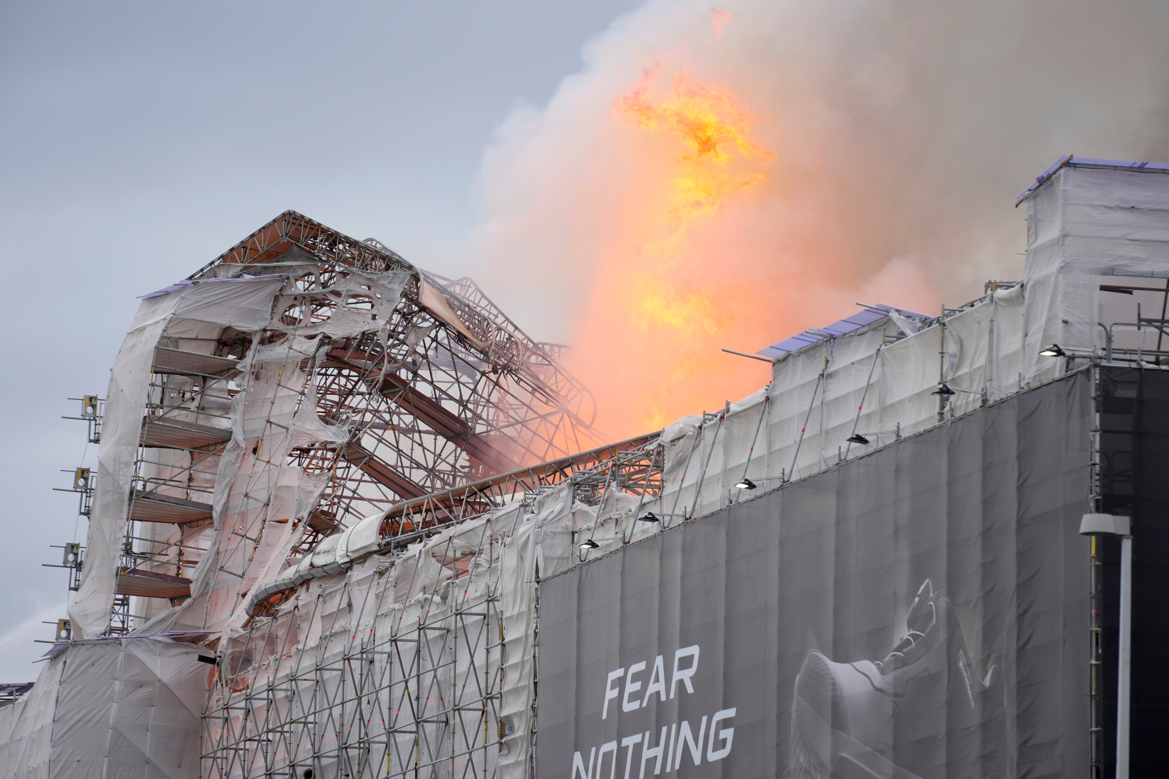 Flames and smoke rise from the old stock exchange in Copenhagen