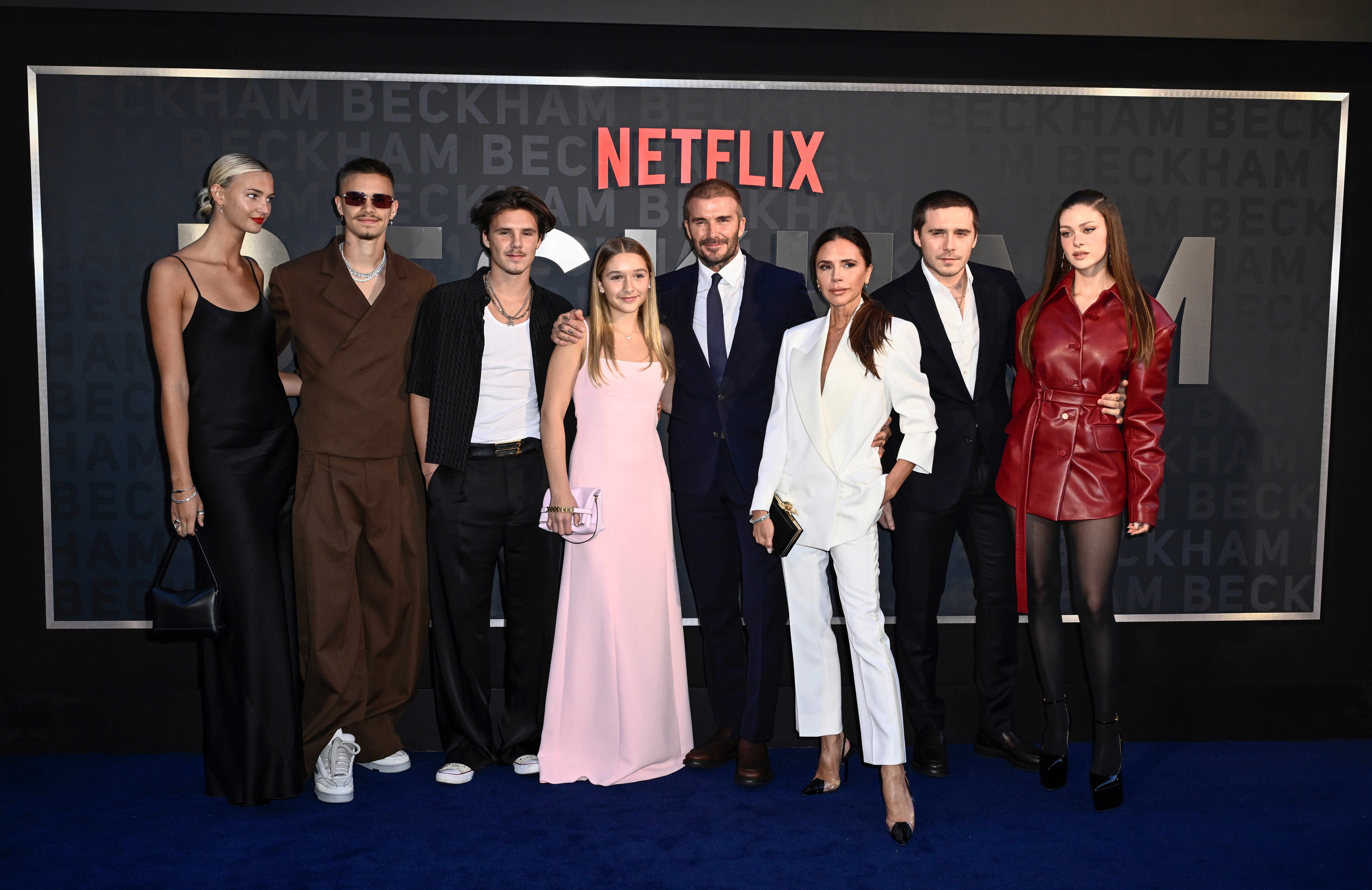(L-R) Mia Regan, Romeo Beckham, Cruz Beckham, Harper Beckham, David Beckham, Victoria Beckham, Brooklyn Peltz Beckham and Nicola Peltz Beckham attend the Netflix 'Beckham' UK Premiere at The Curzon Mayfair in London, October 2023