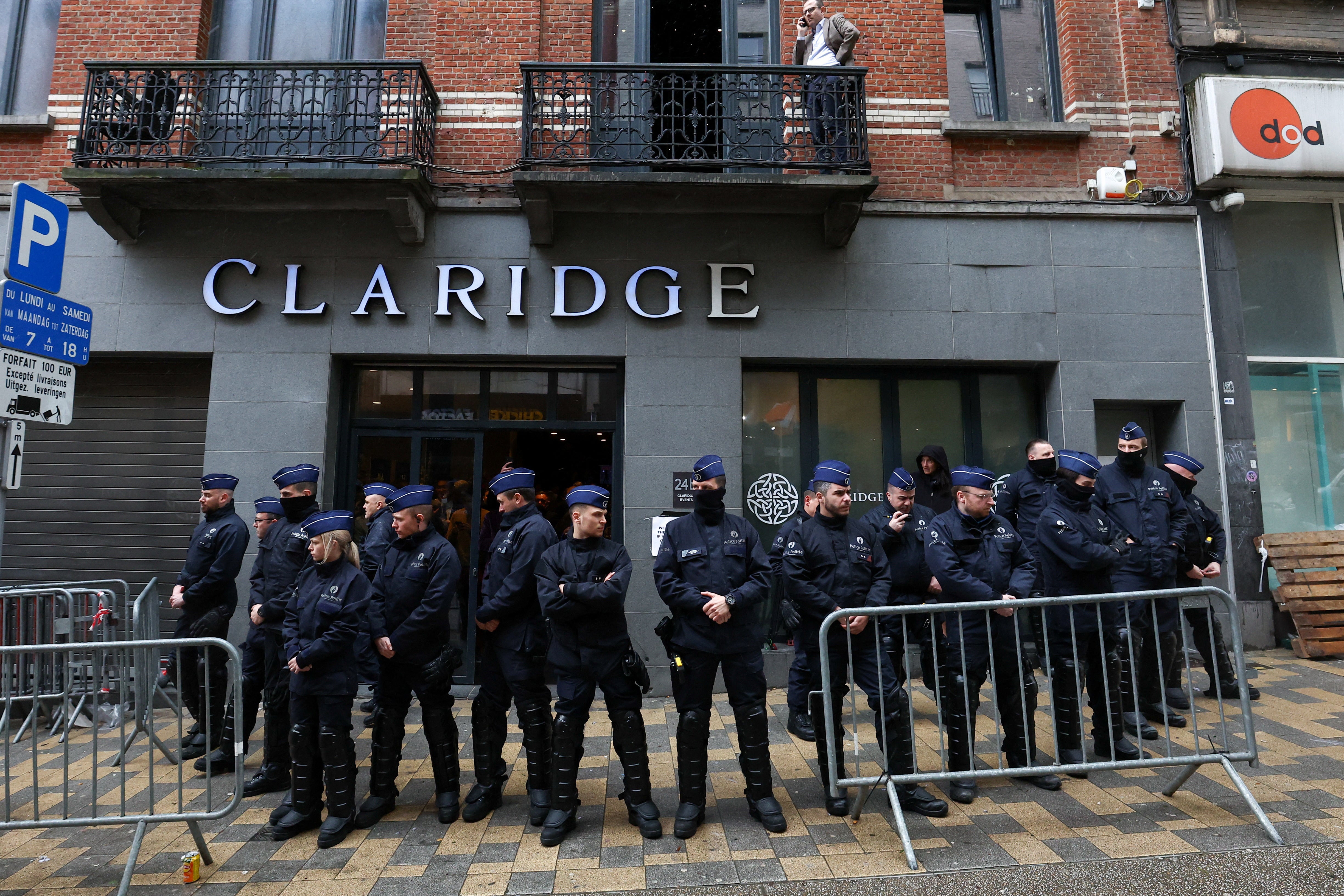 Officers secure the area outside the venue