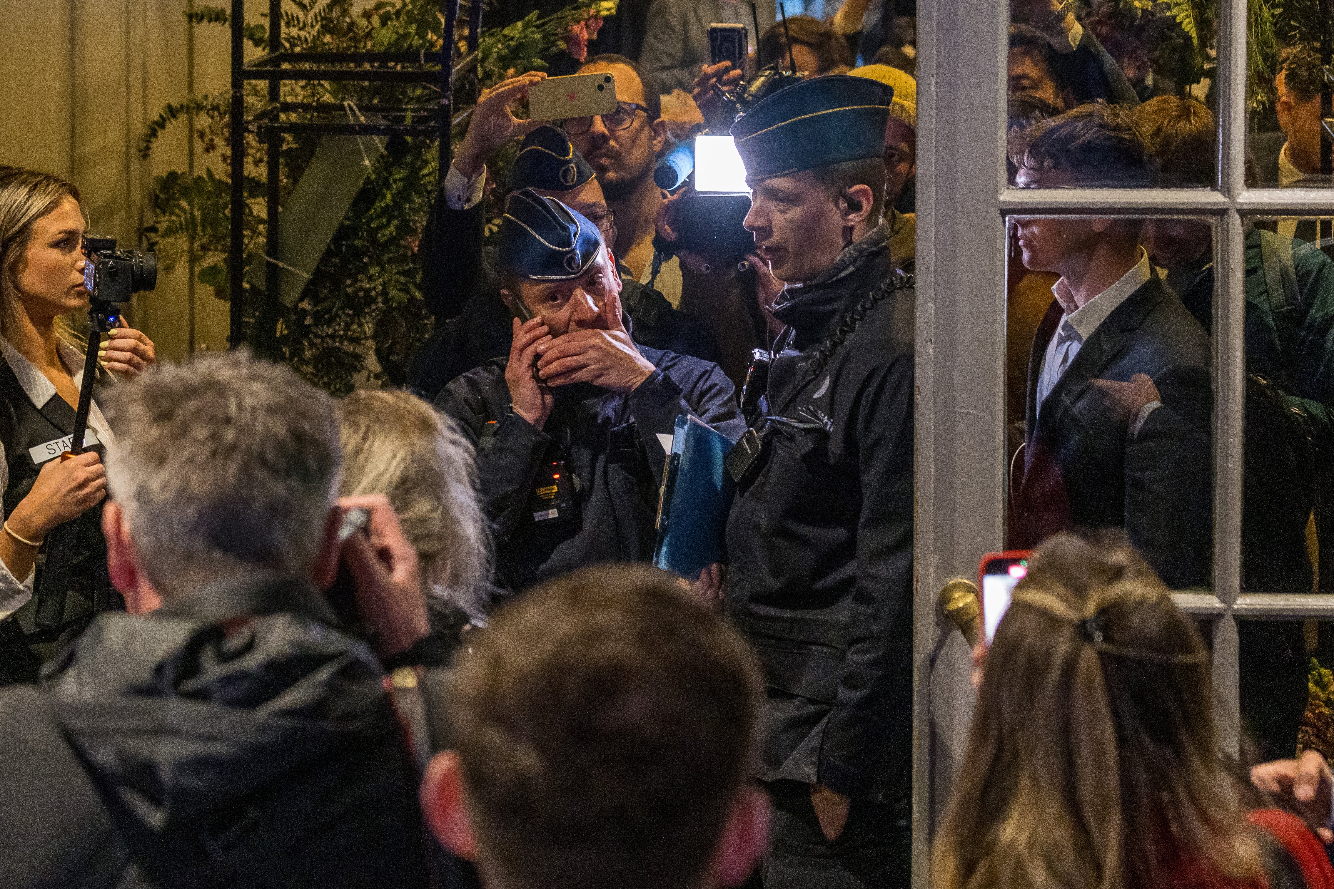 Police officers at the venue after the National Conservatism Conference was ordered to be shut down