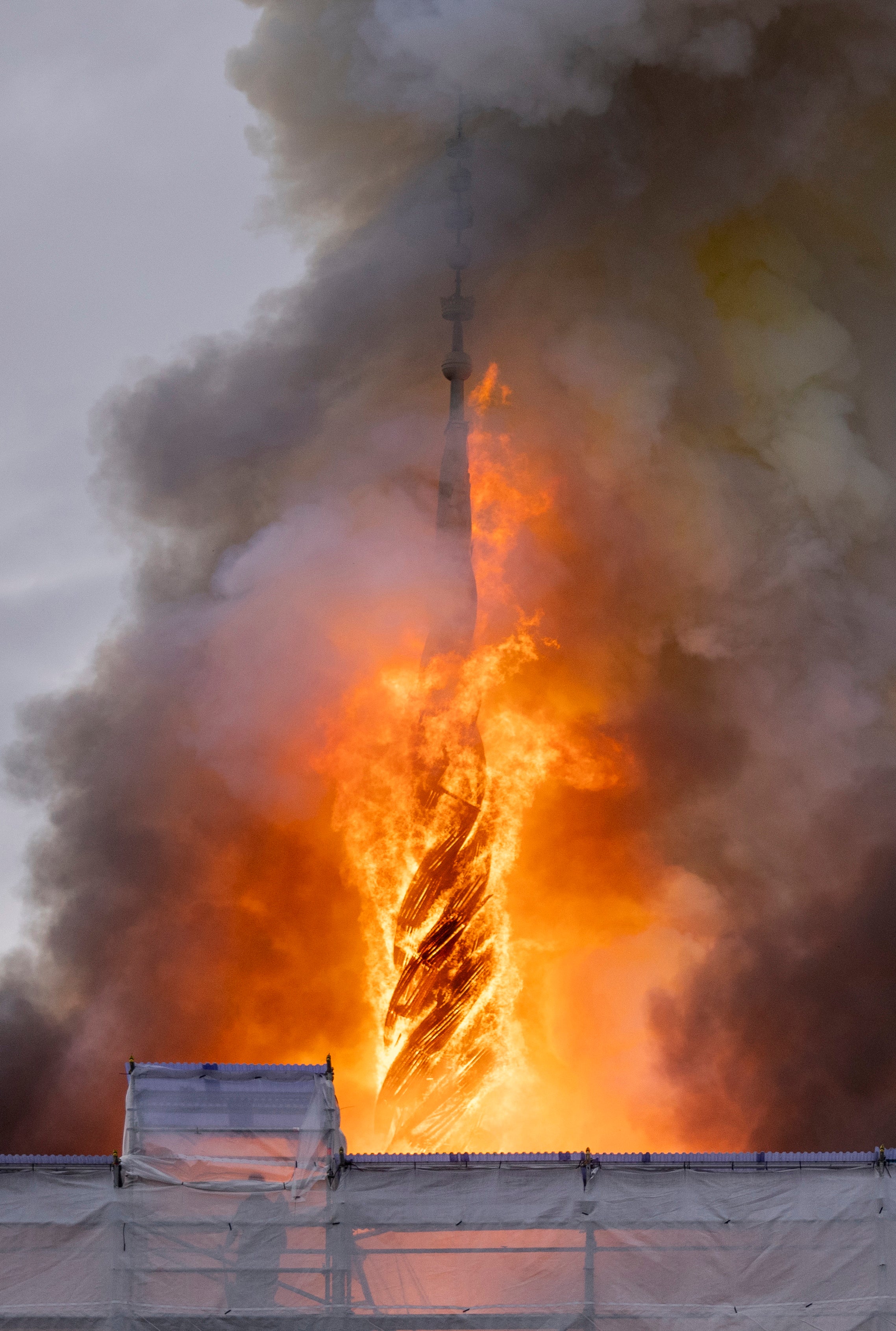 Flames wrap around the dragon spire