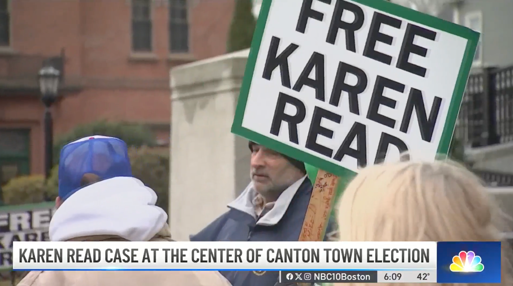 Protesters, like the one pictured earlier this month outside a Massachusetts courthouse, have carried signs calling for Ms Read’s acquittal