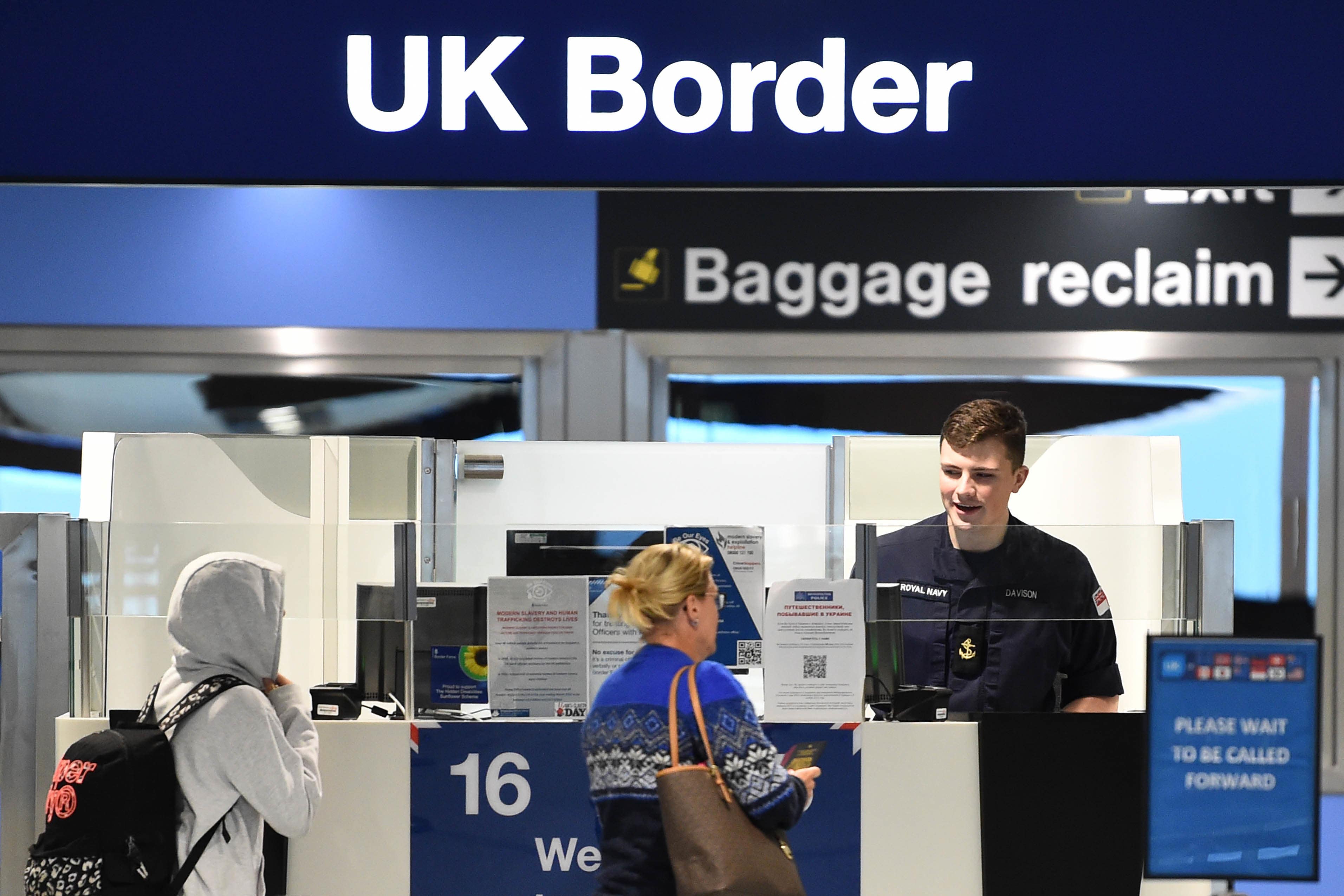 A member of the military at passport control (Peter Powell/PA)