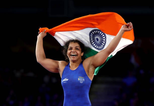 Sakshi Malik celebrates winning the Women’s Freestyle 62 kg gold medal match at the Birmingham 2022 Commonwealth Games