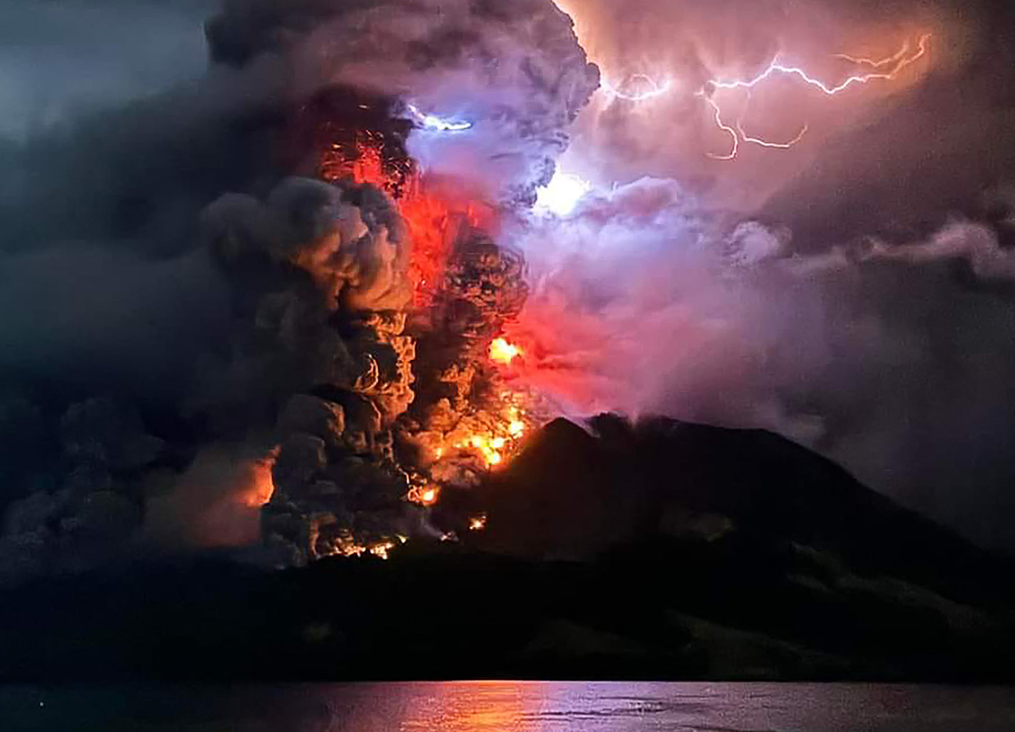 Mount Ruang spews hot lava and smoke as seen from Sitaro, North Sulawesi