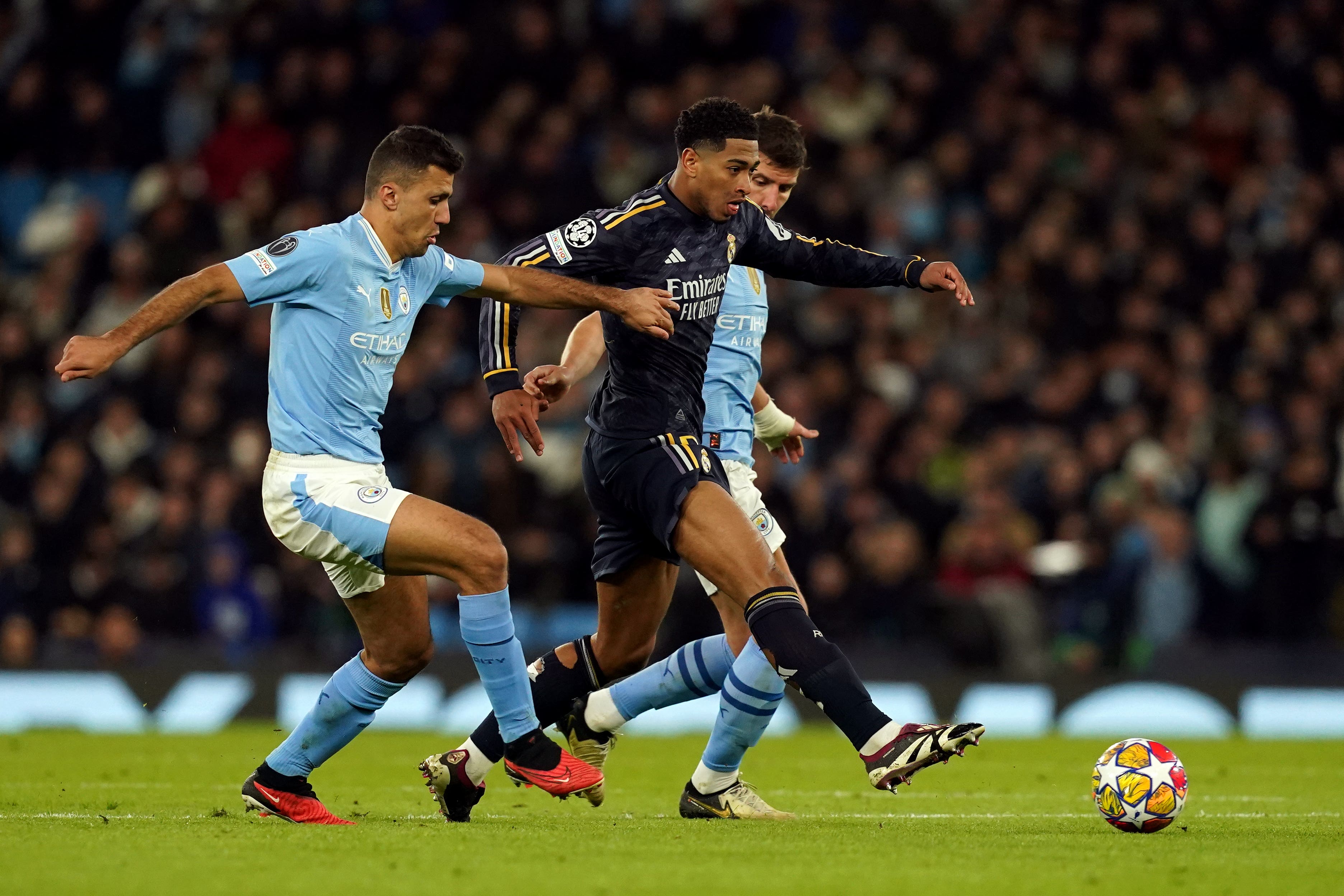 Rodri, left, returned to City’s starting line-up against Real Madrid (Martin Rickett/PA)