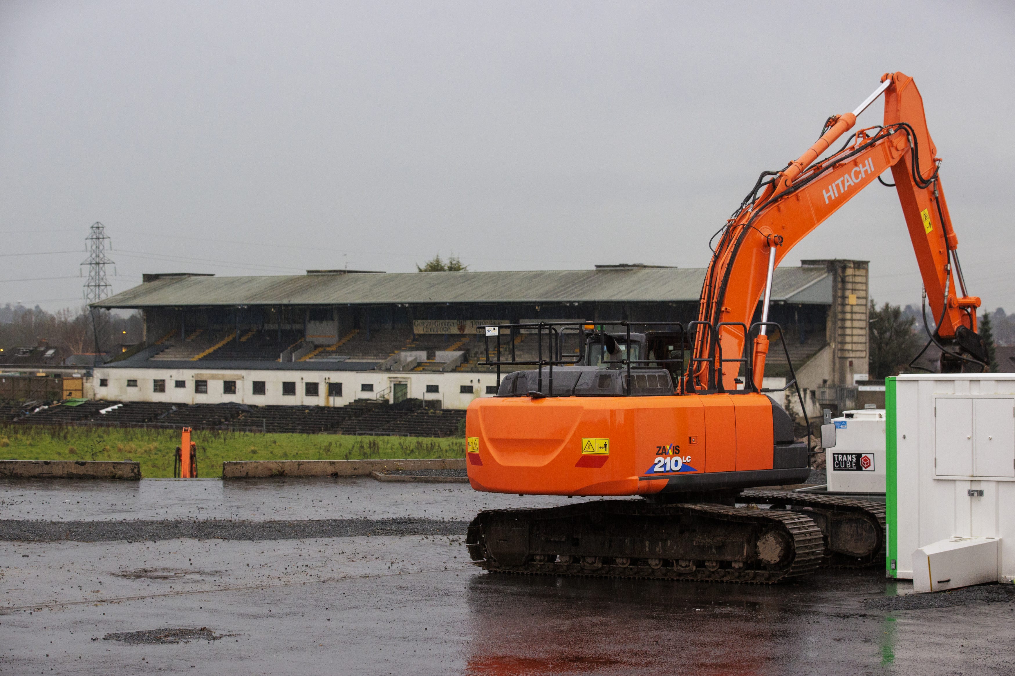 Contractors with excavators have begun clearing the concrete seating terraces at GAA stadium in Belfast (PA)